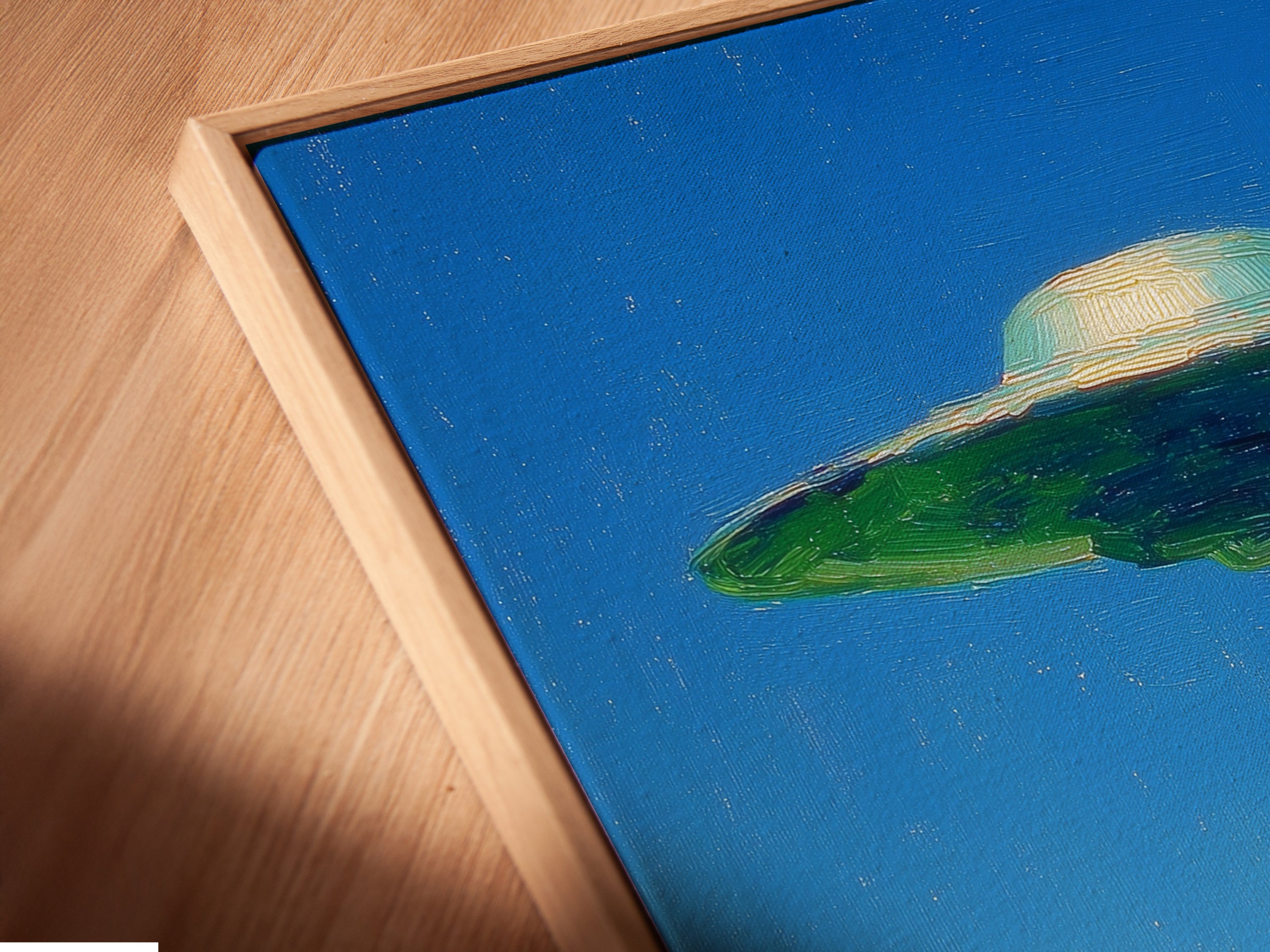 Close-up of a canvas print in a floating frame. The UFO artwork seems to float off the wall. This offers a modern gallery-like presentation. The floating frame enhances the surreal landscape. It is ideal for showcasing your new sci fi art canvas.