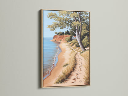Coastal Beach Canvas Artwork in an Oak Frame. The serene ocean view print showcases a sandy shoreline. Perfect coastal wall art for a beach house. Bring the calming essence of the coast to your living room or bedroom with this beautiful piece.