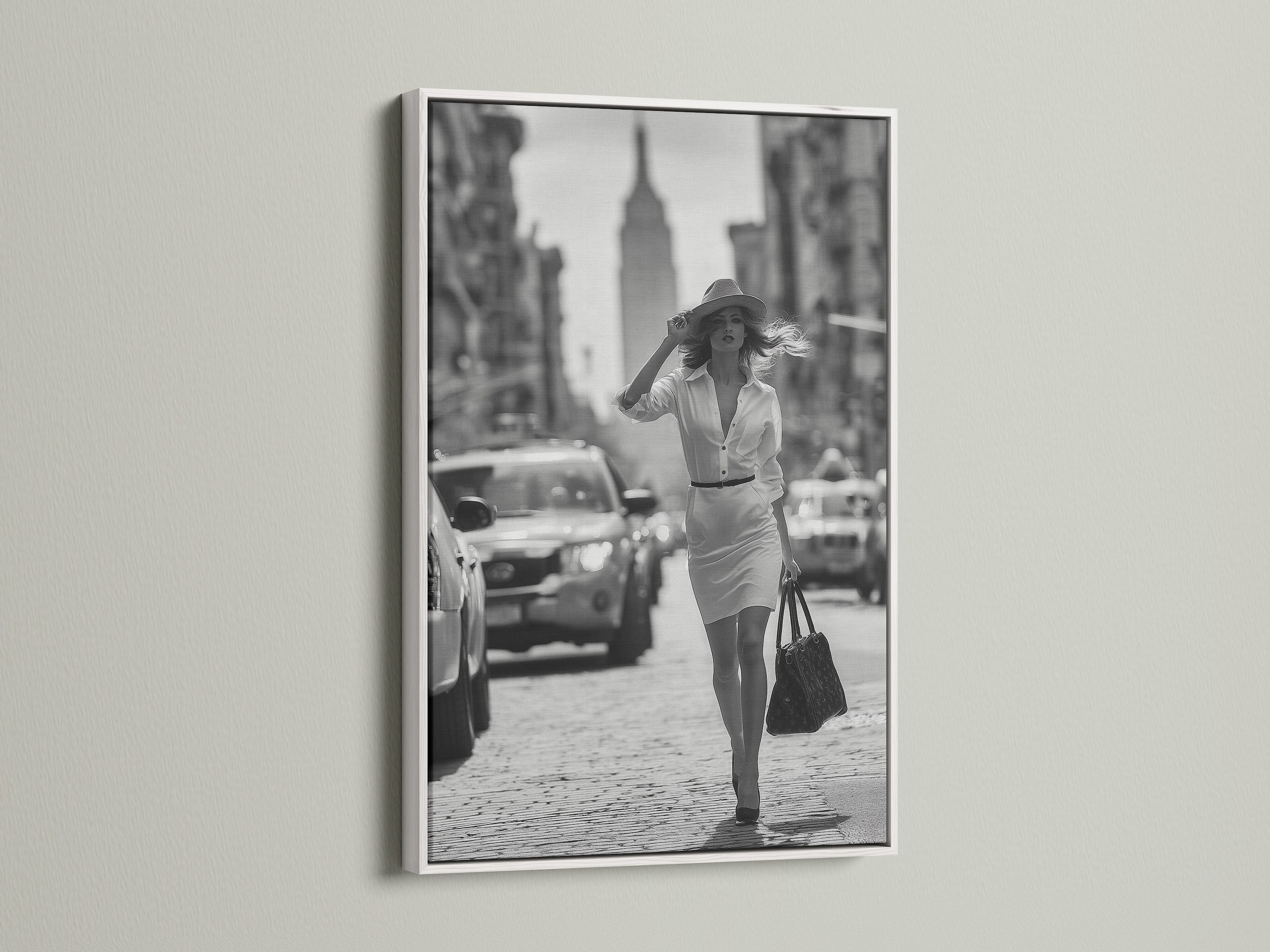 Brighten your walls with a white frame. This frame features a black and white photograph of a woman in a city setting. White frames offer a clean and modern look. Explore our selection to frame your favorite art pieces perfectly.