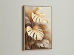 Monstera plant artwork displayed in an oak frame. This tropical wall art brings a natural element indoors. The neutral plant art suits various interior styles. Its earthy tones enhance bedroom wall decor. It's ideal for minimalist and Scandinavian designs.
