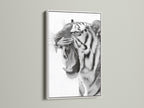 A white frame highlights the intricate details of the tiger art. The crisp white finish provides a clean modern look. It allows the artwork to take center stage. A versatile choice that brightens up any space. Add a touch of wild beauty to your home.