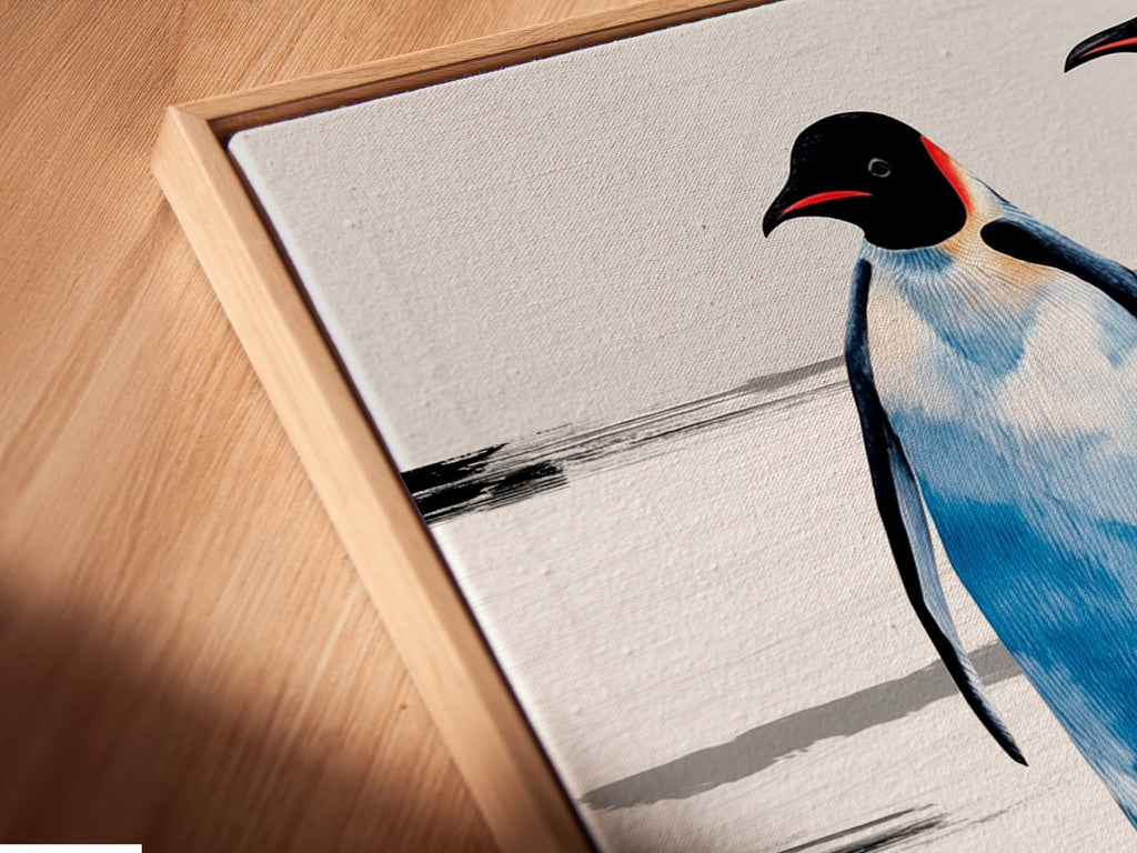 Close-up of a canvas print in a floating frame. The penguin family artwork is beautifully displayed. This coastal wall decor enhances nurseries and living rooms. A unique animal artwork for any home.