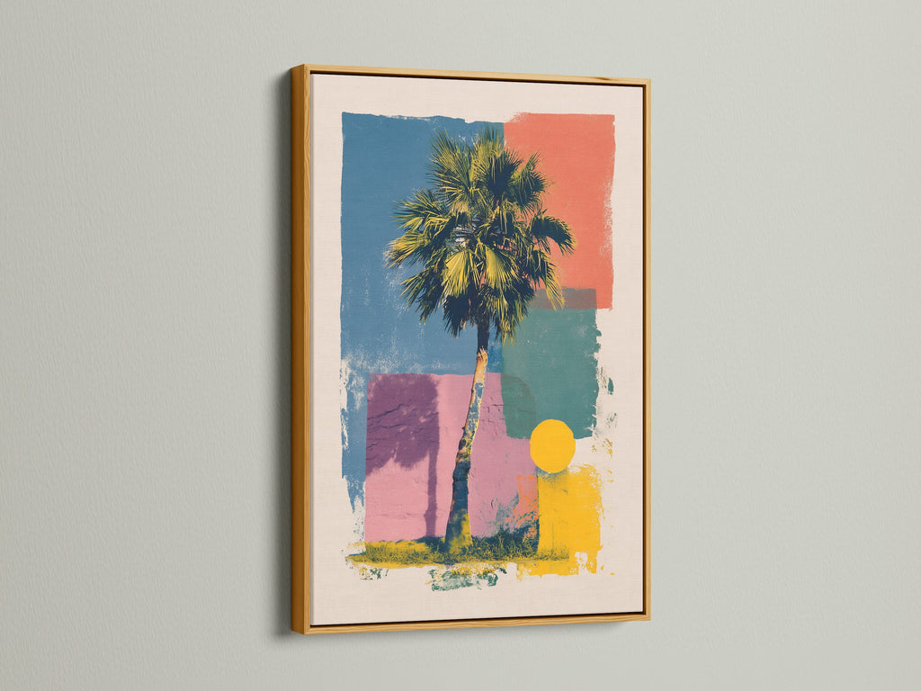 Artwork in a gold frame is mounted on a wall. The artwork includes a palm tree and geometric shapes in multiple colors. The gold frame adds a luxurious and elegant touch. Perfect for adding a piece of framed artwork to your space.