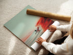 A woman is carefully rolling fine art poster paper. Preserving the quality of art prints. Discover our range of fine art posters. Get archival-quality prints. Perfect for framing and display. Shop now.