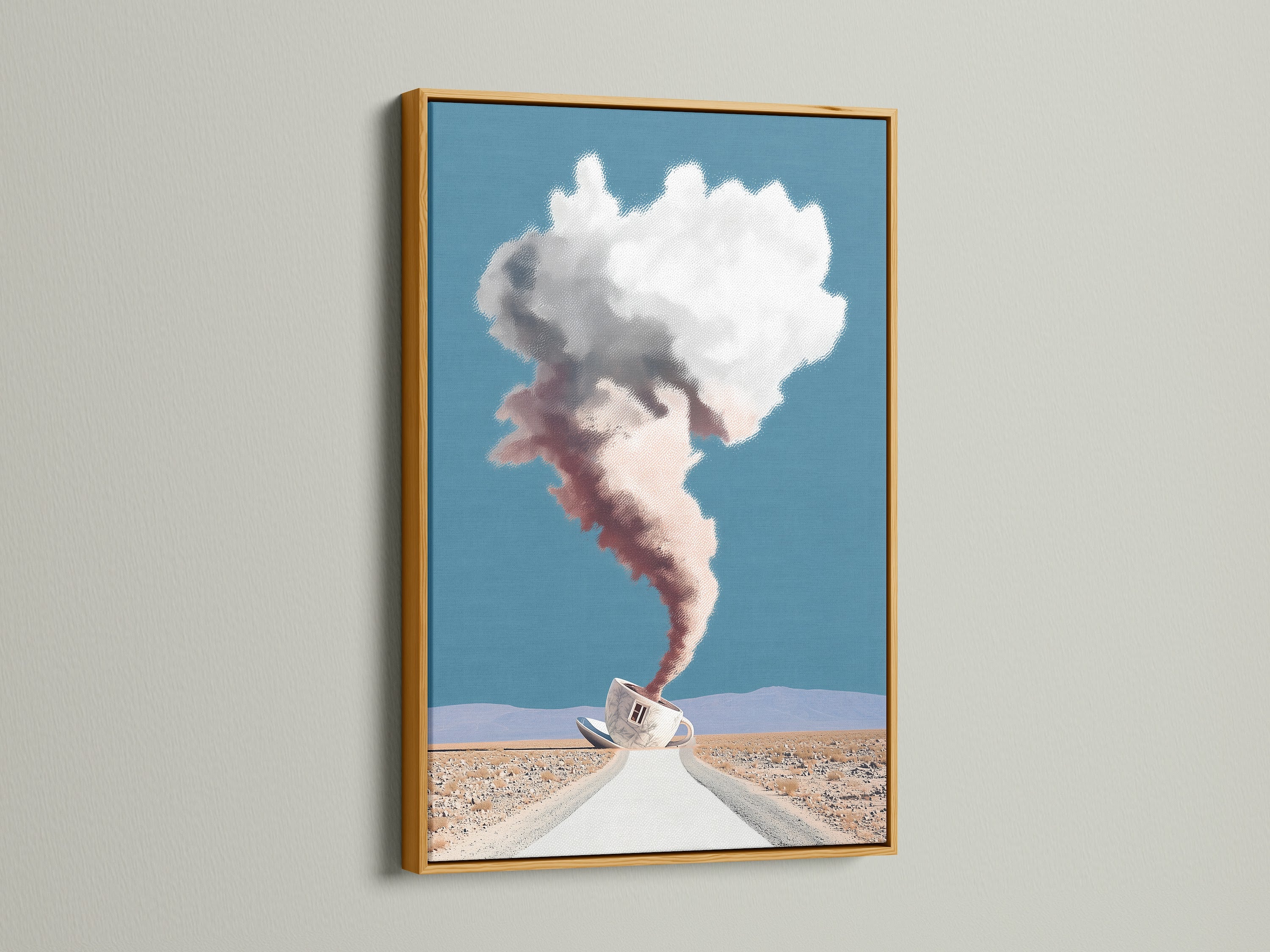 Surreal Coffee Cup Artwork in a Gold Frame. The desert landscape wall art adds a dreamy cloudscape. Perfect for modern office decor. The gold frame enhances this unique artwork. It's a fine art print for interior designers.