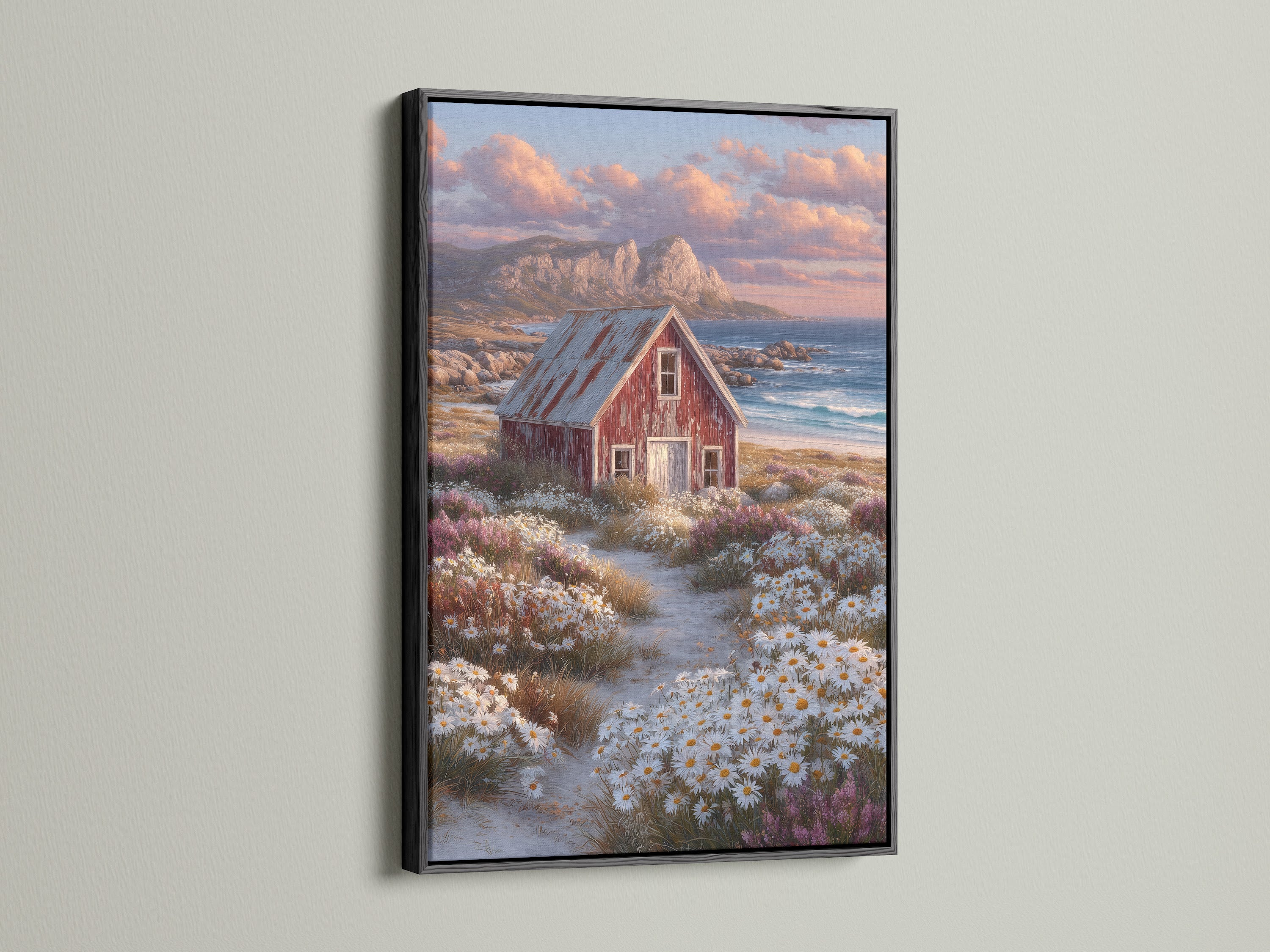 Seaside wall art with a coastal landscape and rustic red barn. This artwork is framed in a sleek black frame. The piece adds elegance to any country home. Perfect for creating a cozy coastal atmosphere.