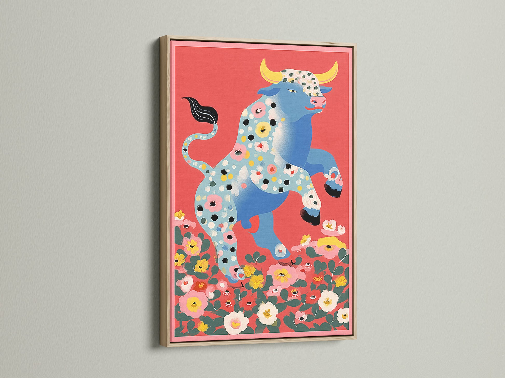 Floral Bull artwork in an oak frame. The artwork features a colorful bull with floral accents. Its folk art charm makes it great for living rooms and entryways. The retro canvas adds a touch of vintage style to any room. Perfect for those seeking unique wall art.