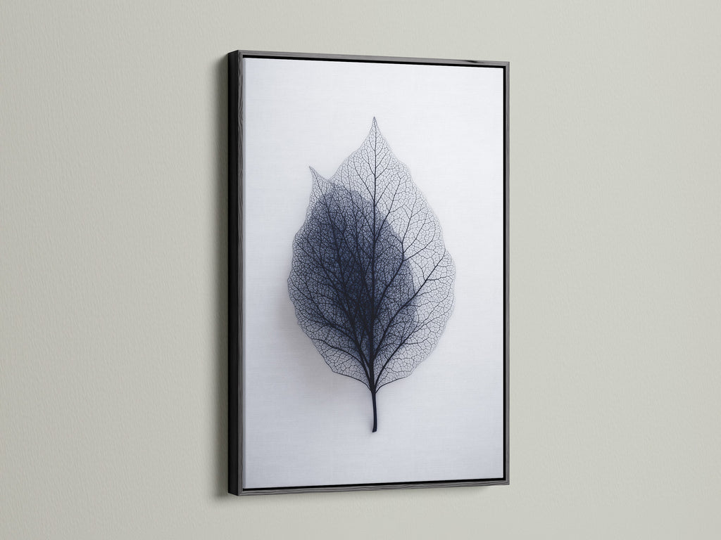 Leaf art displayed in a sleek black frame. The black frame adds a touch of sophistication. It makes a bold statement on any wall. This frame enhances the artwork's contrast. Choose a black frame for a modern gallery feel.