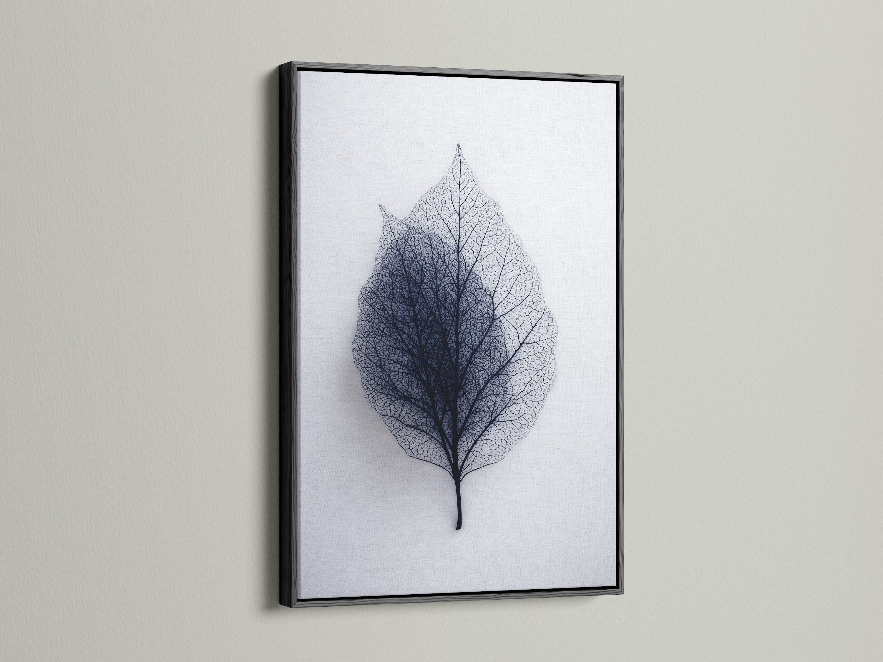 Leaf art displayed in a sleek black frame. The black frame adds a touch of sophistication. It makes a bold statement on any wall. This frame enhances the artwork's contrast. Choose a black frame for a modern gallery feel.