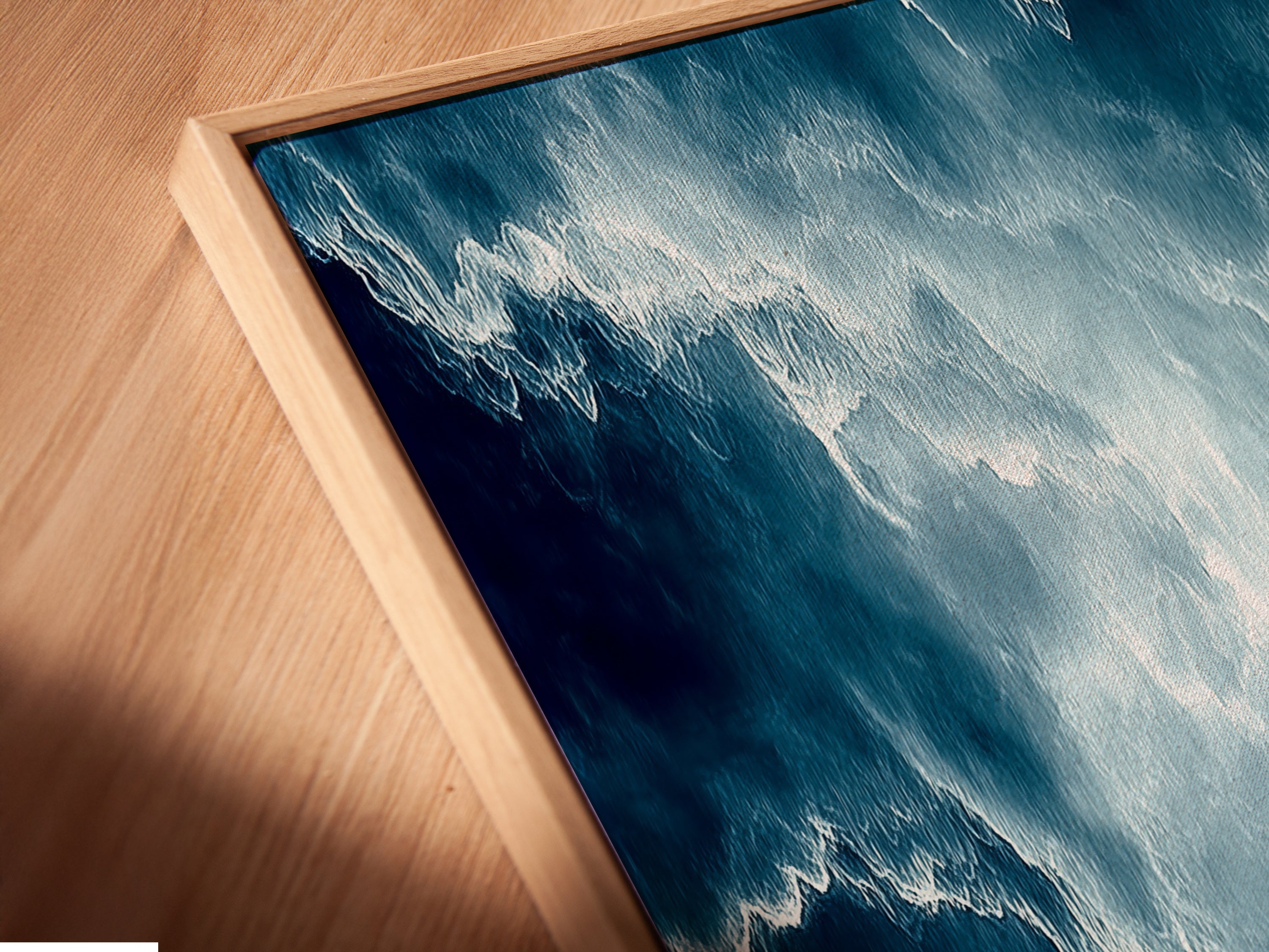 Angled close-up showcasing a canvas print in a floating frame. The abstract cloudscape artwork is beautifully displayed. The floating frame adds a modern touch. Notice the ethereal print quality and serene decor. Perfect for minimalist spaces.