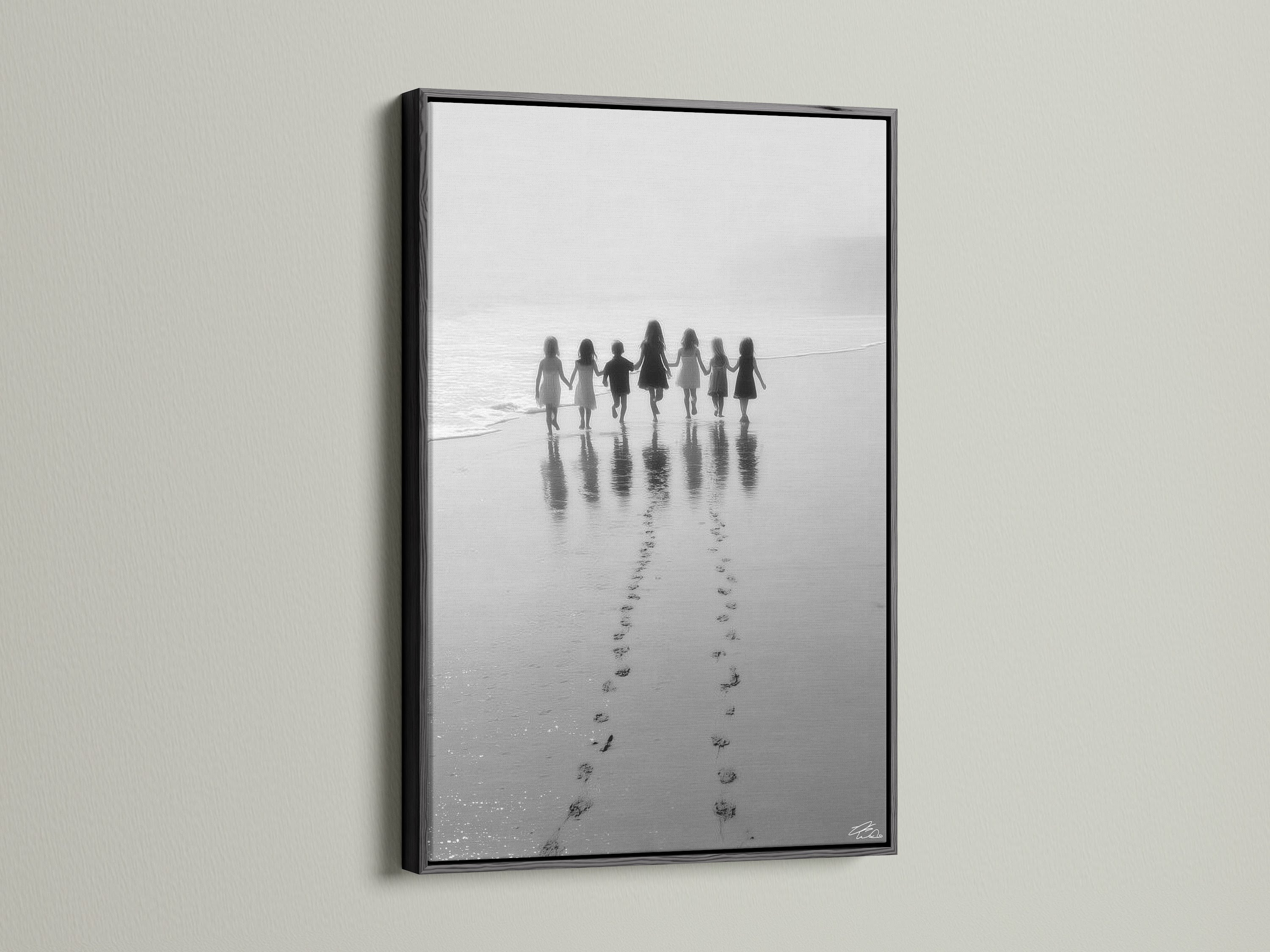 The Beach Walk canvas art is striking in a black frame. This black and white seascape photo adds elegance. Its perfect for nursery decor or any space needing minimalist art. The children print is a timeless family photo. Shop now.