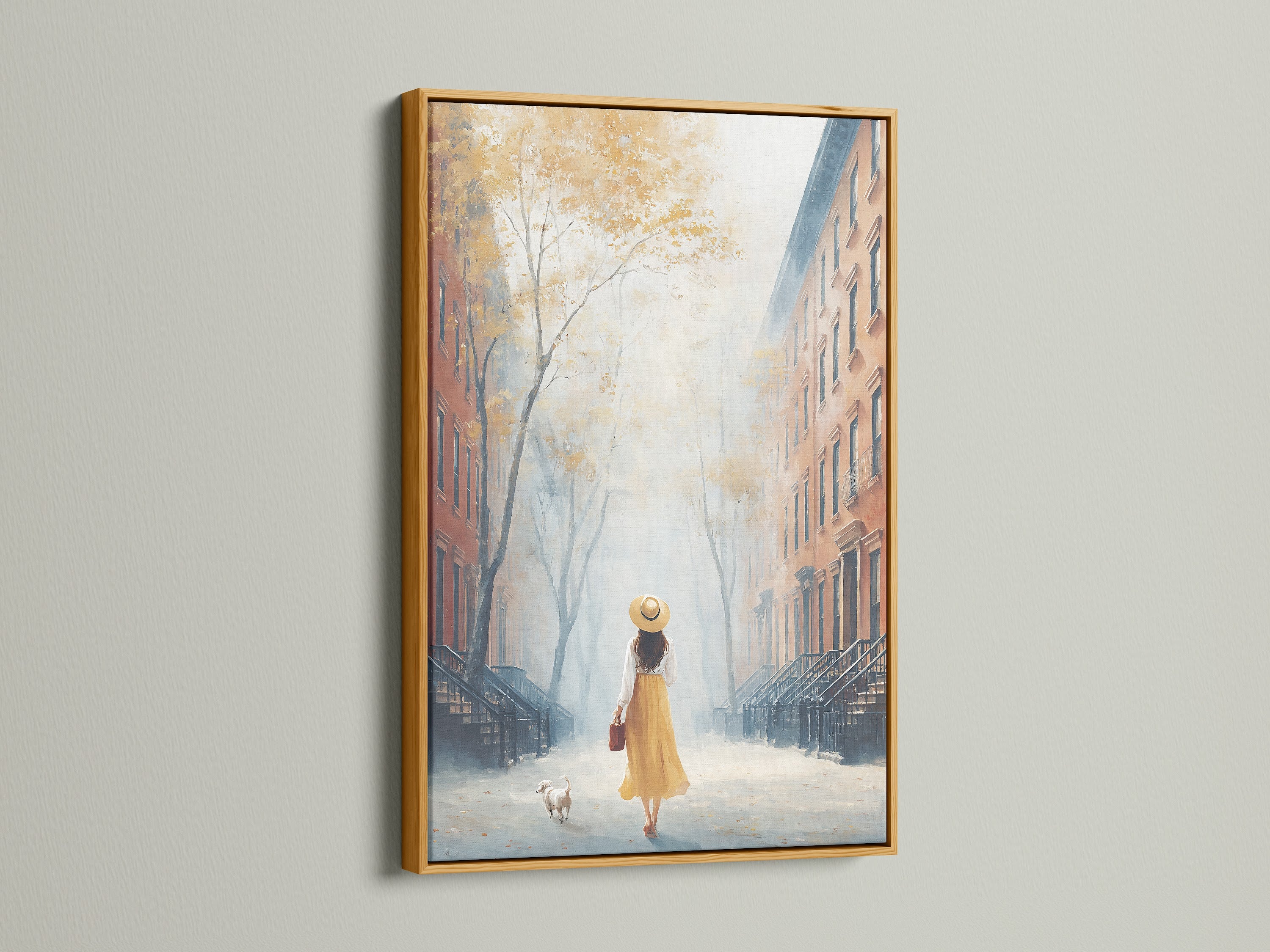 Cityscape canvas print with a gold frame. This artwork shows a girl with her dog. A beautiful autumn scene for your wall. It is perfect as entryway decor or living room art. Adds a peaceful touch.