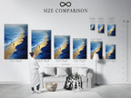 Size comparison chart displayed in an interior setting. The chart shows various sizes of the Beach Walk artwork. This coastal wall art fits any space. The artwork features calming ocean waves. Choose the perfect size for your bedroom decor.