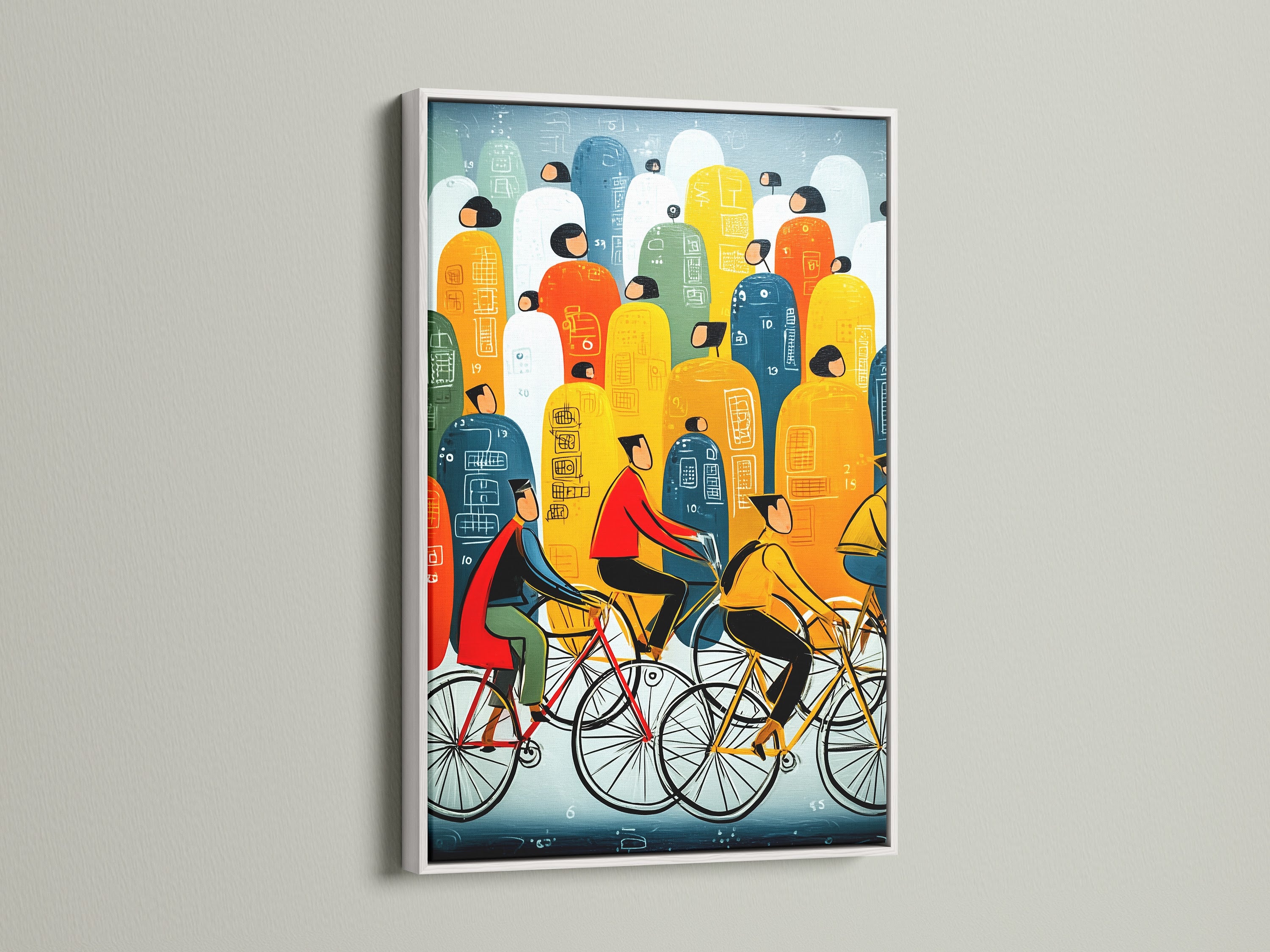 Bicycle Riders Canvas Print in a white frame. Abstract city wall art. The white frame offers a clean modern look. Colorful commute artwork for office decor. This artwork brightens any space. A stylish addition to your home decor.