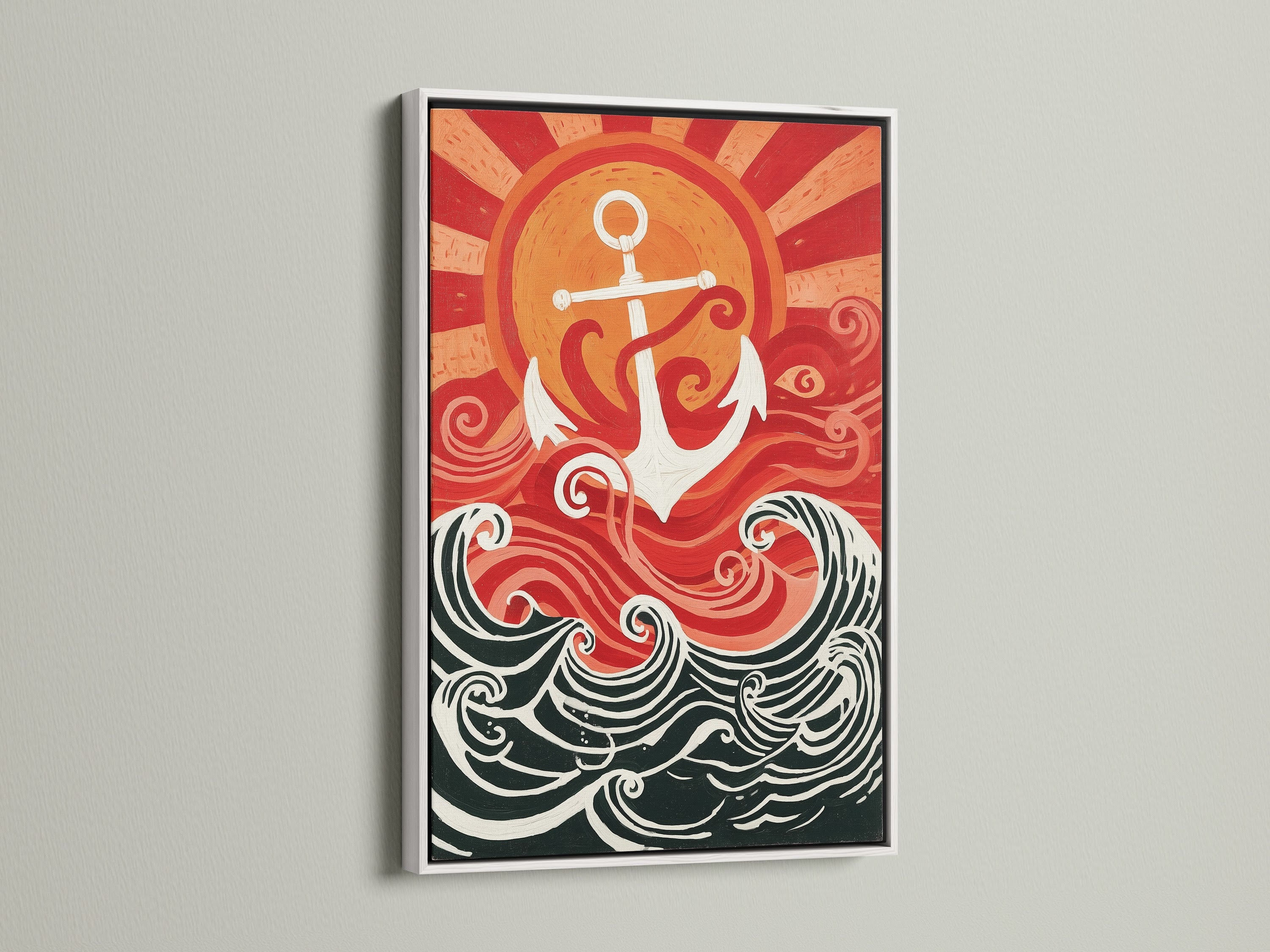 Nautical art displayed in a white frame. The artwork features a white anchor and ocean waves. The colors are red white and black. Our coastal artwork is perfect for any room. This sea themed decor will enhance your space. It's ideal for a beach house or a sea lover's home.