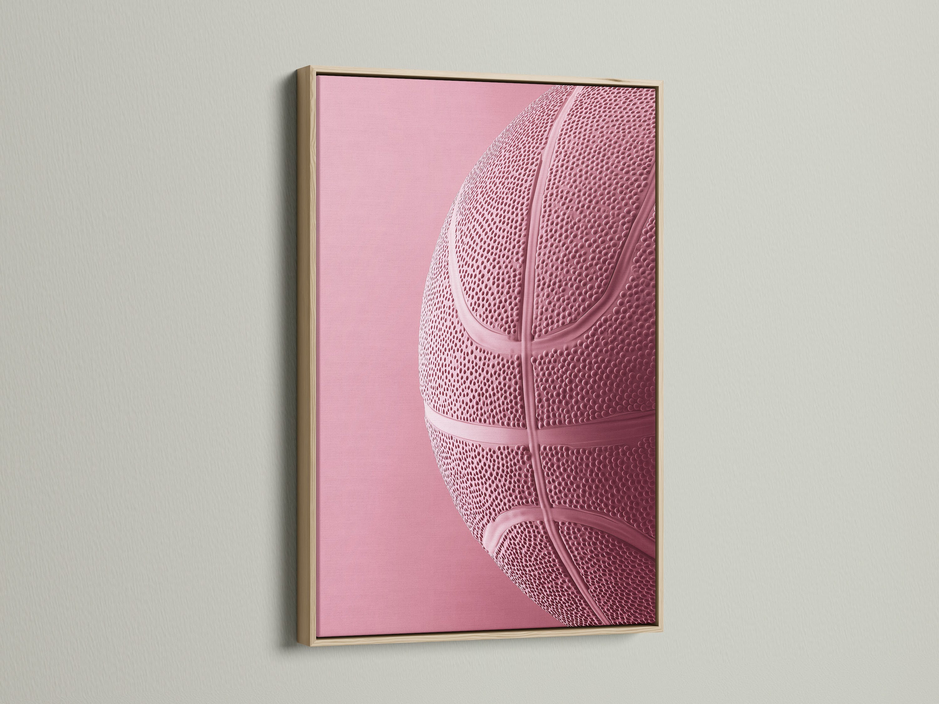 Oak Frame displayed on a wall. This frame enhances a pink basketball art print. The oak frame offers a natural touch. It enhances artwork for a gallery-worthy display. Elevate your space with framed art.