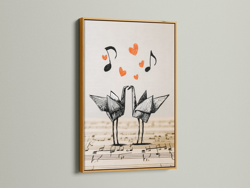 Artwork of origami cranes in a gold frame. The artwork showcases two origami cranes on a music sheet background. Red hearts and music notes accent the piece. The gold frame adds a touch of elegance.