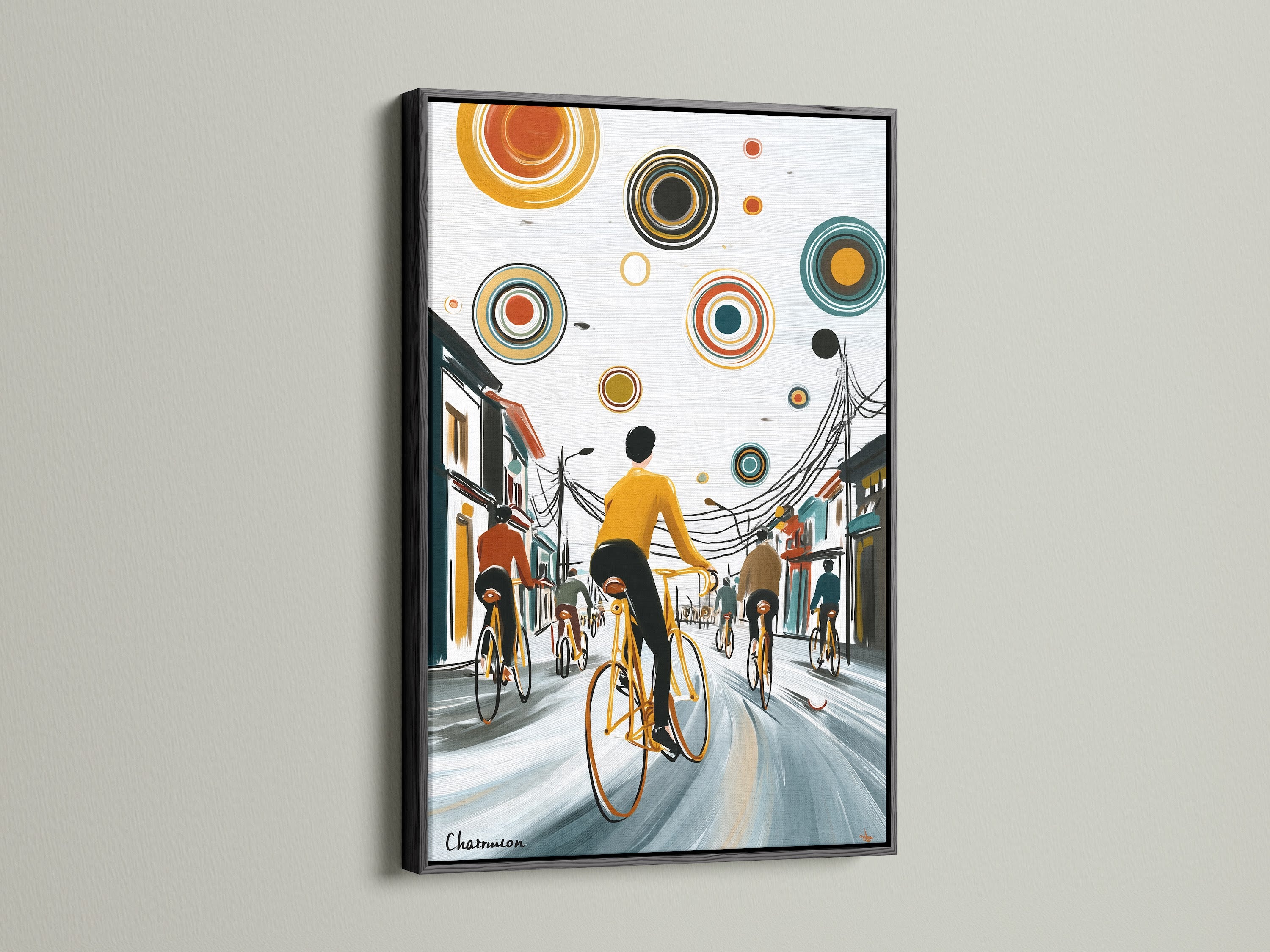 City Cyclists artwork is framed in sleek black. The cityscape print features cyclists on a teal and orange street. This contemporary print offers a modern aesthetic. Perfect for living room wall art.