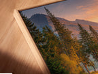 Angled close up of a mountain lake canvas print in a floating frame. This landscape artwork brings nature indoors. Perfect for cabin decor and nature enthusiasts. The floating frame adds a modern touch. Enhance your living space with this unique piece of nature photography and forest artwork.