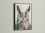 A striking black frame showcases a colorful owl canvas print. This owl wall decor adds a modern touch to any room. The black frame makes the colors pop. Perfect for bird lovers.