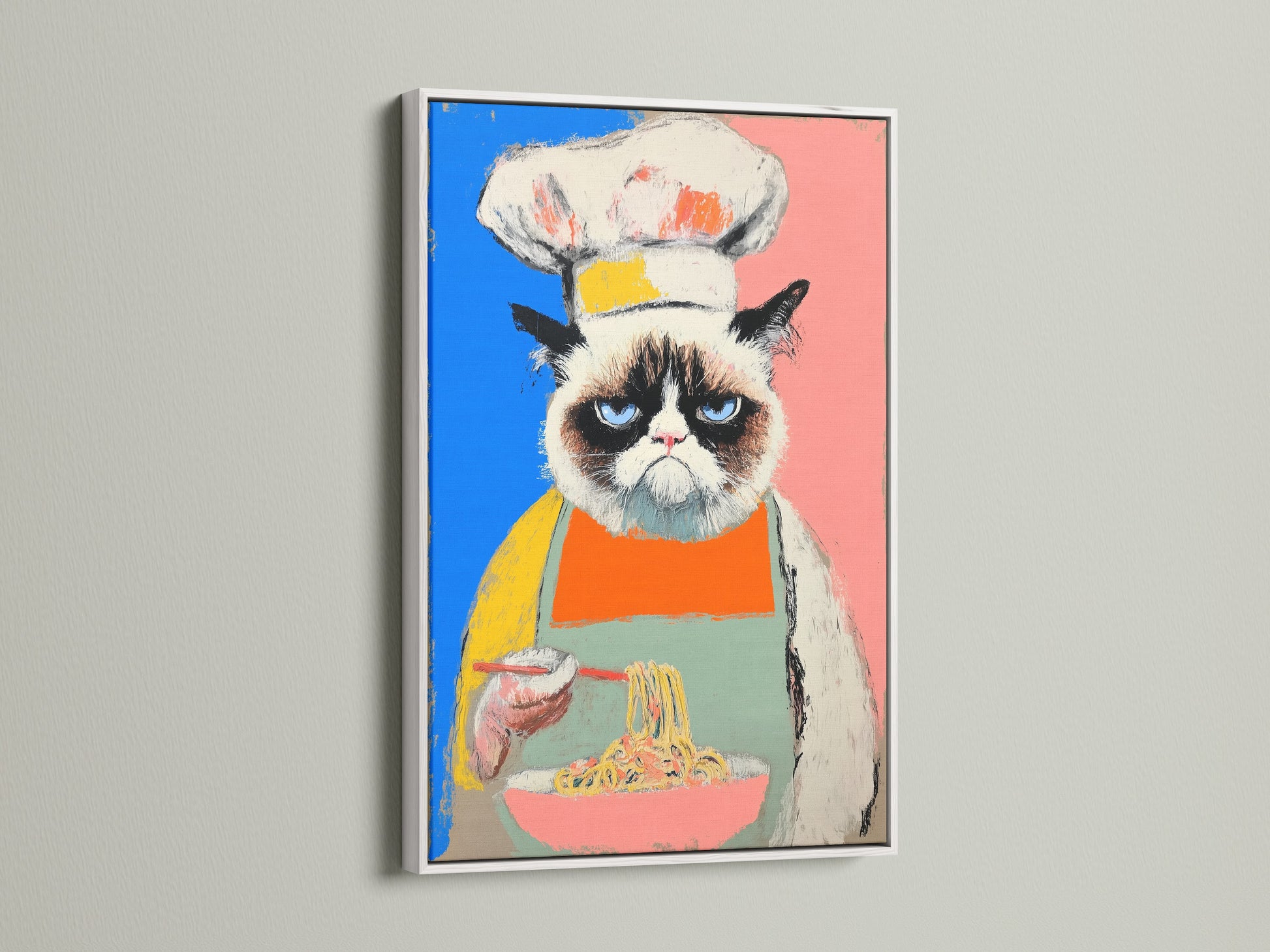 This chef cat artwork is framed in white. The funny cat print is great for kitchen wall decor. This colorful pop art canvas is perfect for the dining room. It is elevated wall art for modern styles.