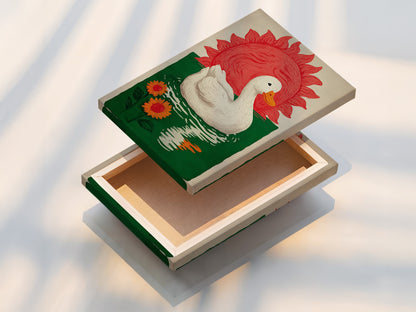 Close up of a stretched canvas print featuring a white duck floating on green water with orange sunflowers. A red sun is in the background. Great for Living Room Wall Art Bedroom Wall Decor cabin wall art studios lobbies clinics and cafes.