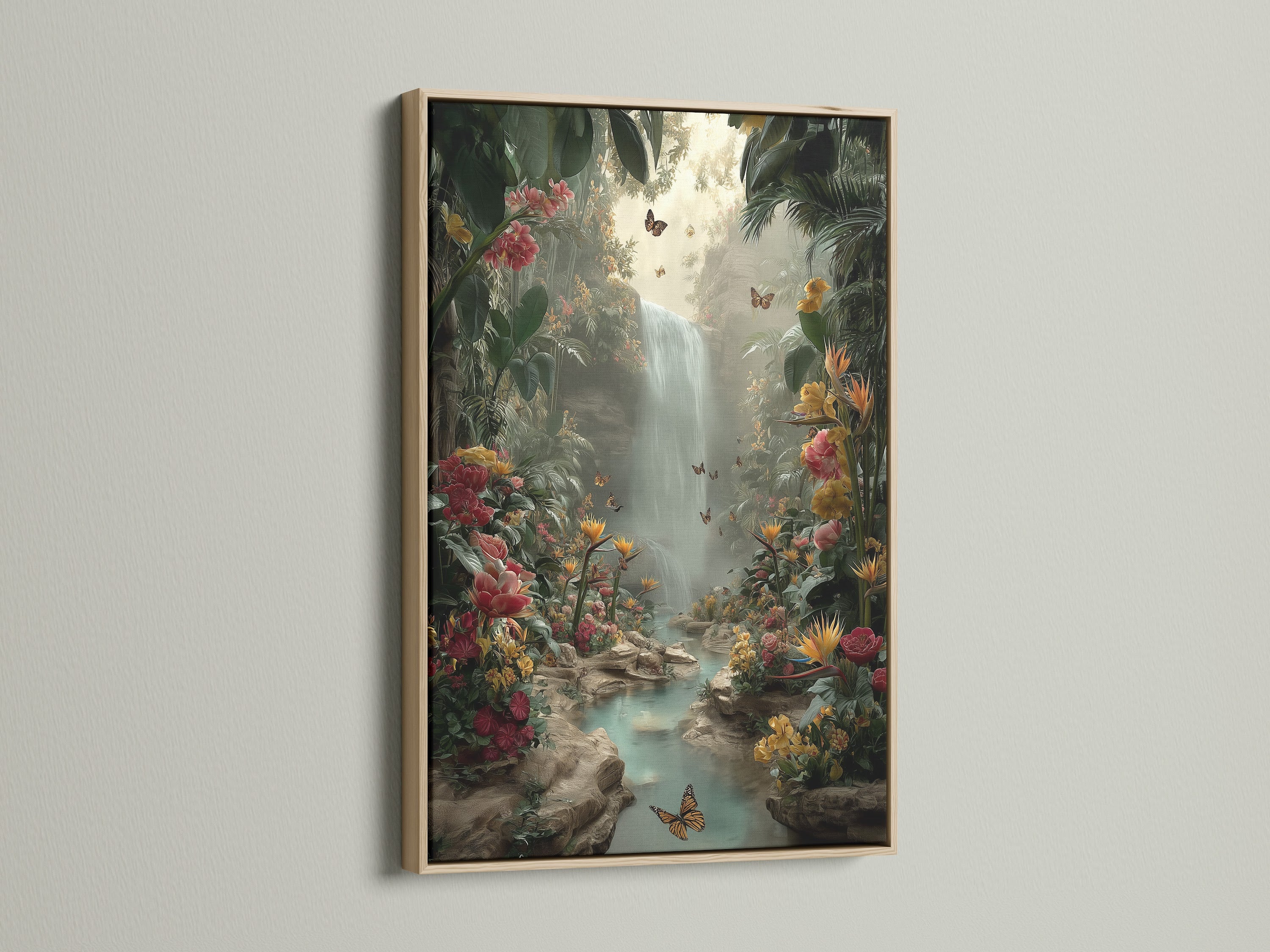 Tropical Waterfall wall art showcased in an oak frame. The artwork depicts a serene jungle scene with a waterfall and butterflies. Vibrant flora lines the clear water's edge.  This framed canvas adds a natural touch to your interior. Perfect wall decor for living rooms and bedrooms.