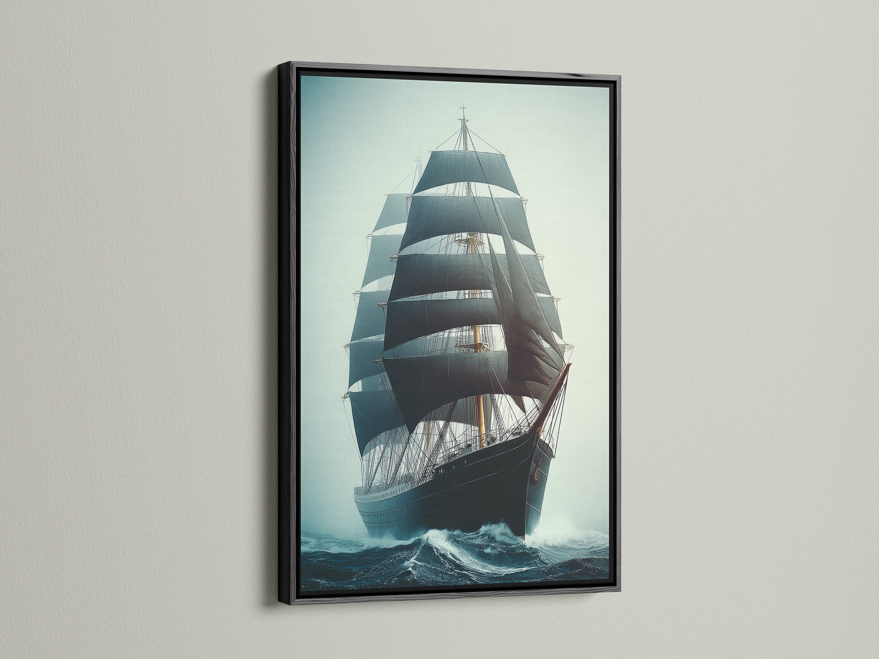Sailing Ship Canvas Print with a black frame. The artwork showcases a vintage tall ship. The black frame creates a bold contrast. This nautical artwork is great for office wall decor.