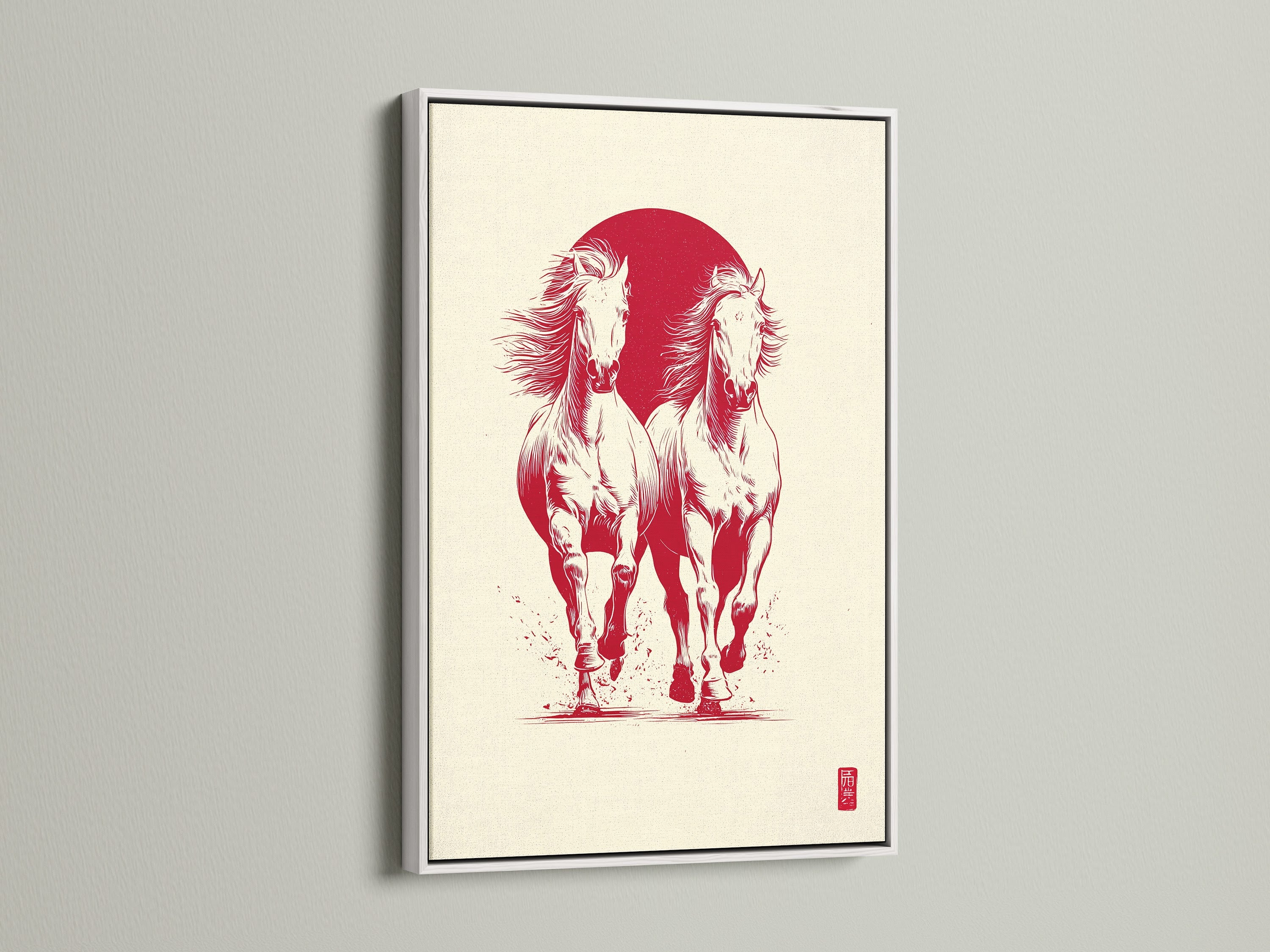 Artwork featuring two white horses running in front of a red sun. The art piece is displayed in a white frame. The white frame offers a clean and modern look. It helps to brighten the artwork.