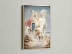 Framed coastal artwork in an oak frame. The artwork features a Santorini-style house canvas with a blue door and floral stairway. This sea view print brings Greek island art to your vacation home decor. Elevate your bedroom wall art with this piece.