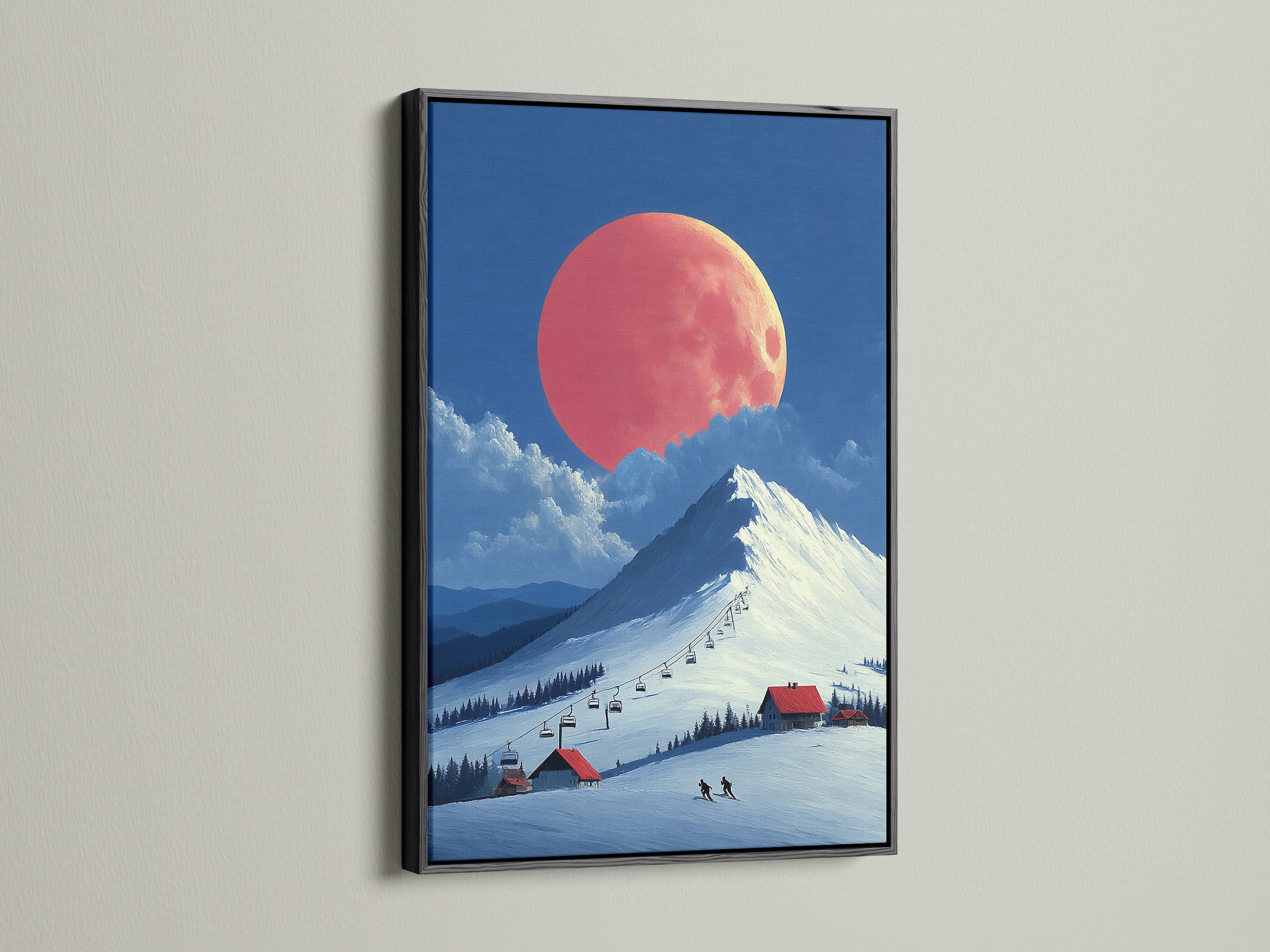 The black frame highlights the dramatic ski resort artwork. The mountain landscape and coral moon create a captivating scene. Ideal for a modern bedroom decor. It's a striking winter canvas print. The black frame adds a touch of sophistication.
