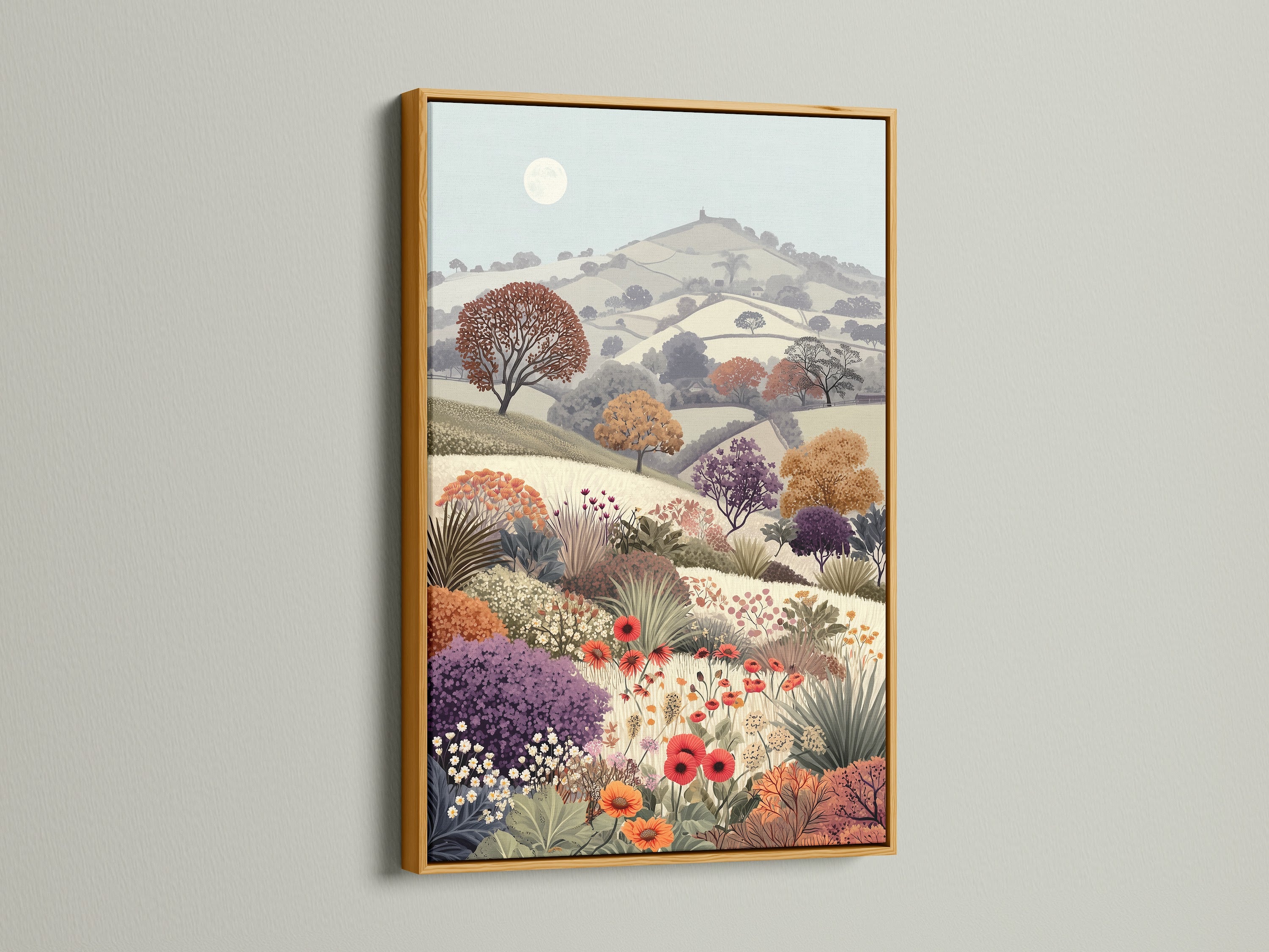 Floral Meadow artwork with a gold frame. The vintage landscape features a flower field and countryside scenery. This botanical artwork brings a touch of rural charm. The serene pastel colors and wildflower print add a cottagecore feel to any room. It's perfect for study wall decor and nature enthusiasts