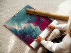 A woman is carefully rolling a fine art poster paper. The paper is high-quality ideal for printing detailed artwork and photographs. This highlights the care and precision involved in creating stunning art prints. Perfect for contemporary wall decor.