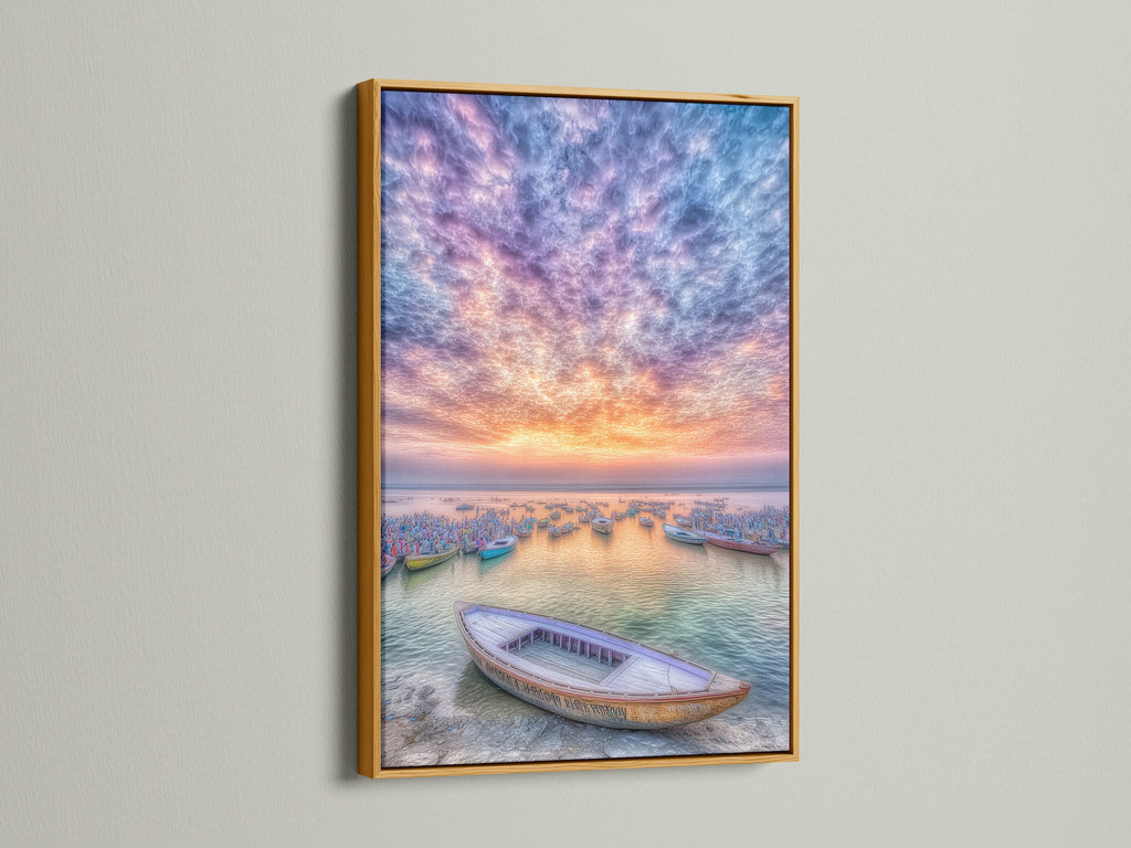 Harbor Sunset canvas print with a gold frame. This beautiful art piece shows fishing boats under a sunset sky. The gold frame enhances the artwork's elegance. The coastal seascape photography adds a touch of luxury to any room. The beige and blue tones create a calming atmosphere. Perfect for adding a touch of glam to your home.