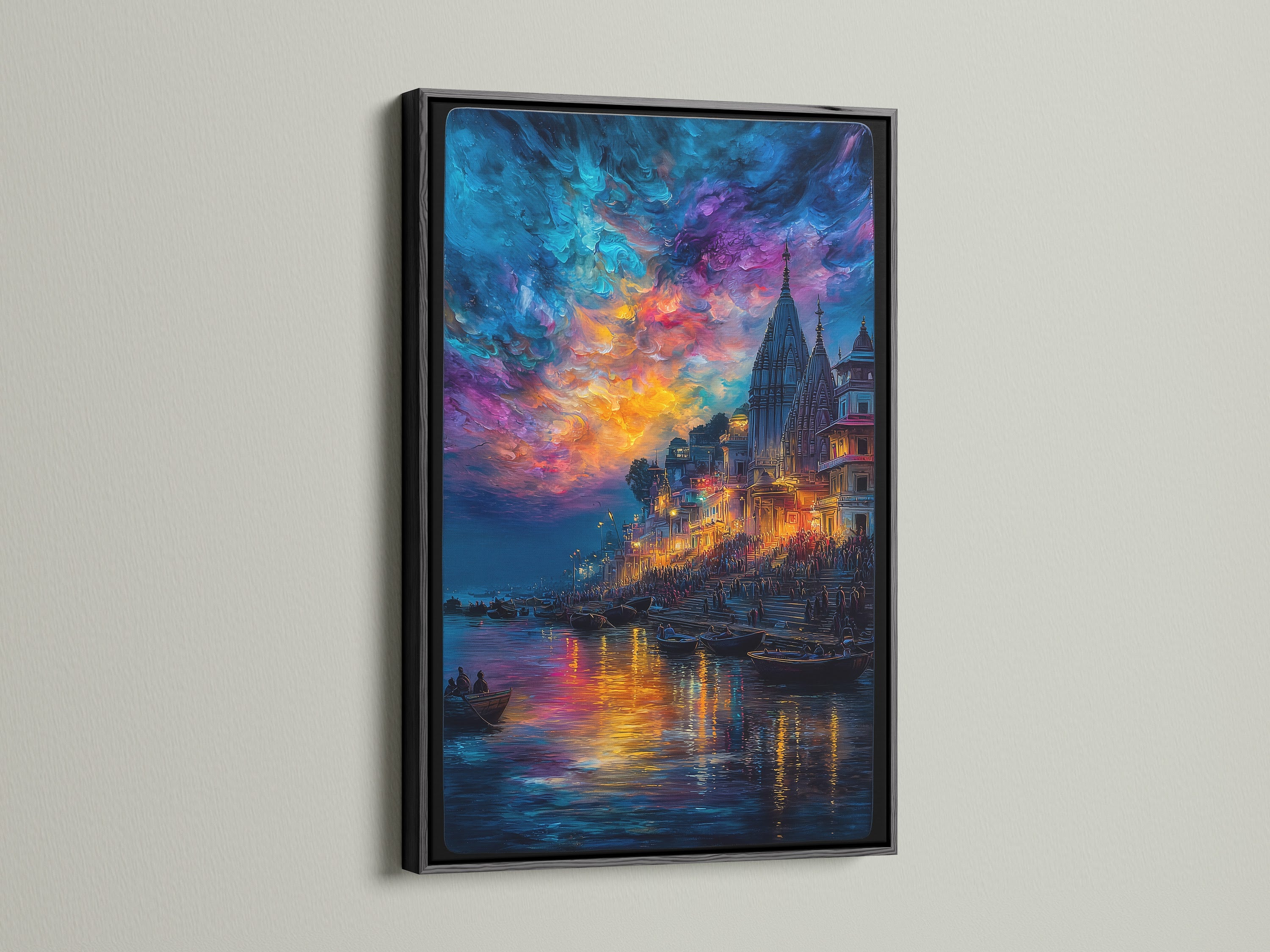 Varanasi River Ghats spiritual artwork in a black frame. This Ganges River print captures the beauty of India. Ideal for meditation room decor or as a statement piece in your living room. The temple wall art adds a touch of sacred art.