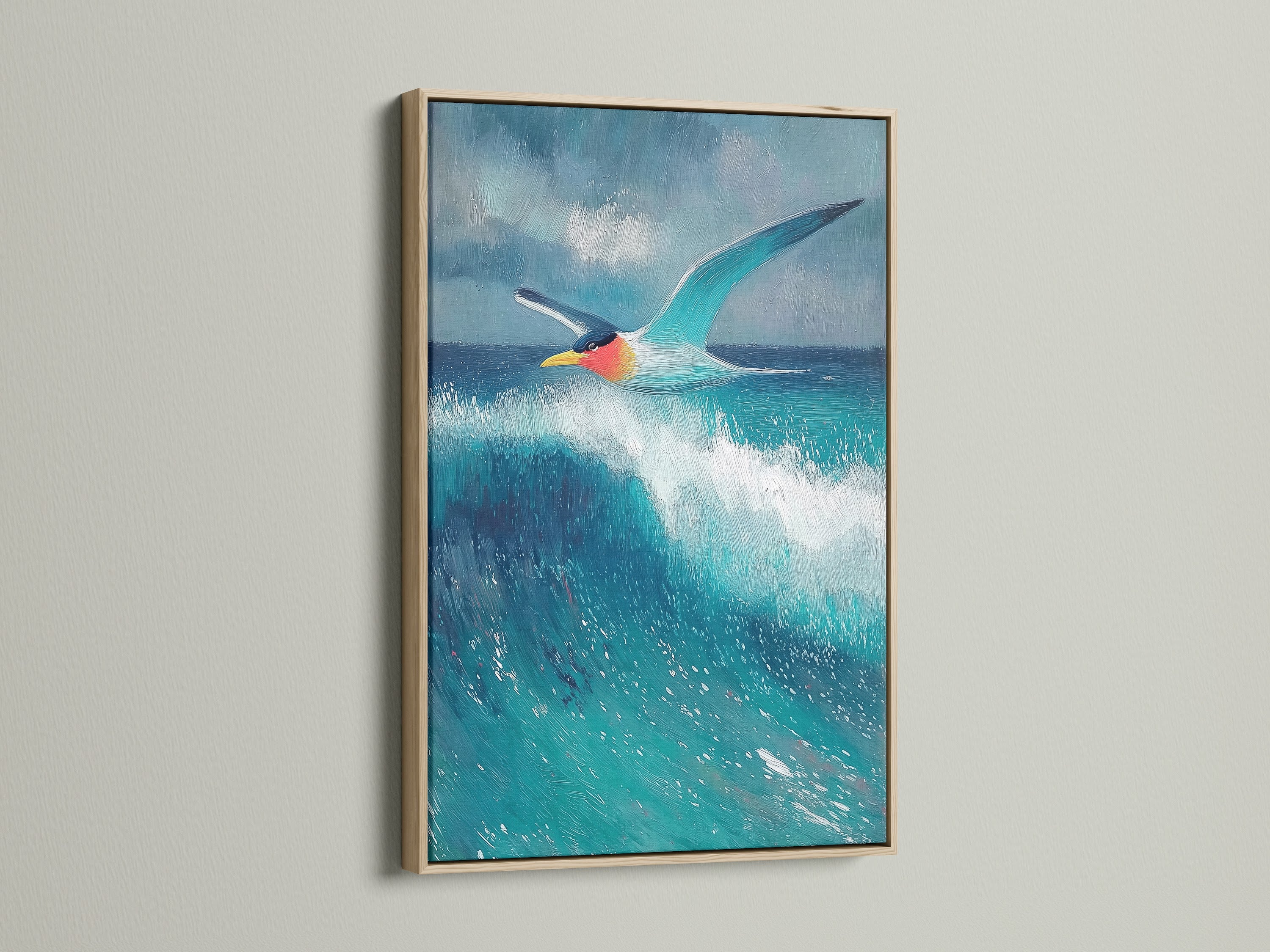 Seagull artwork with an oak frame. This coastal wall art will elevate your living room decor. The ocean print features turquoise art and a seabird print. It is a calming piece.
