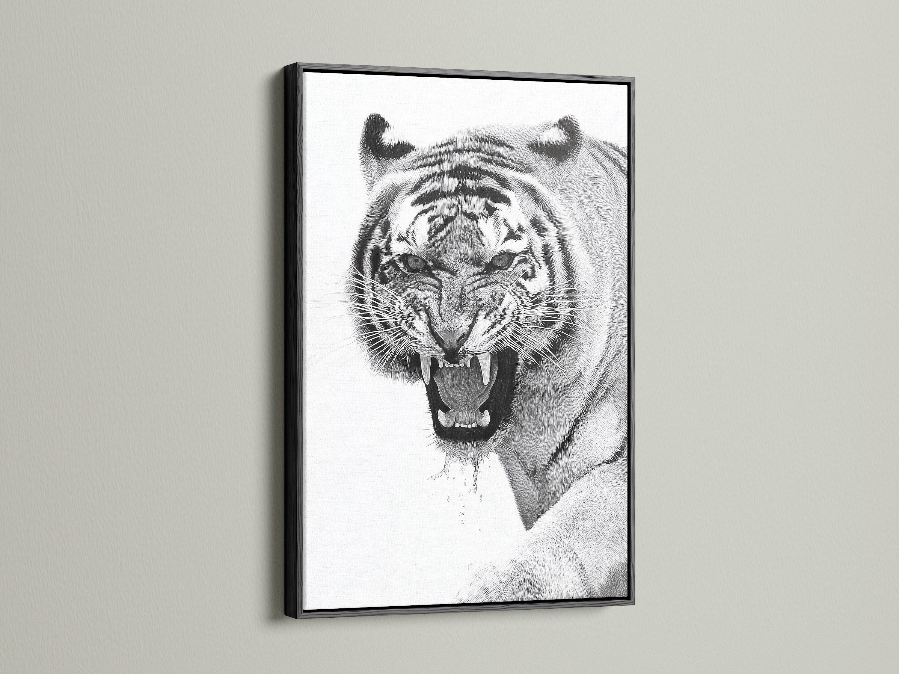 This is a bold tiger artwork set in a sleek black frame. The black frame adds a touch of drama to the artwork. The art piece is perfect for a modern or minimalist space. It brings sophistication and style to any room. The black frame enhances the artwork.