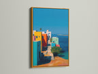 This displays a gold frame encasing a beautiful art print. The frame adds a touch of luxury to the artwork. The print showcases a vibrant seaside vista. It brings warmth and sophistication to any room. The gold frame elevates the piece.
