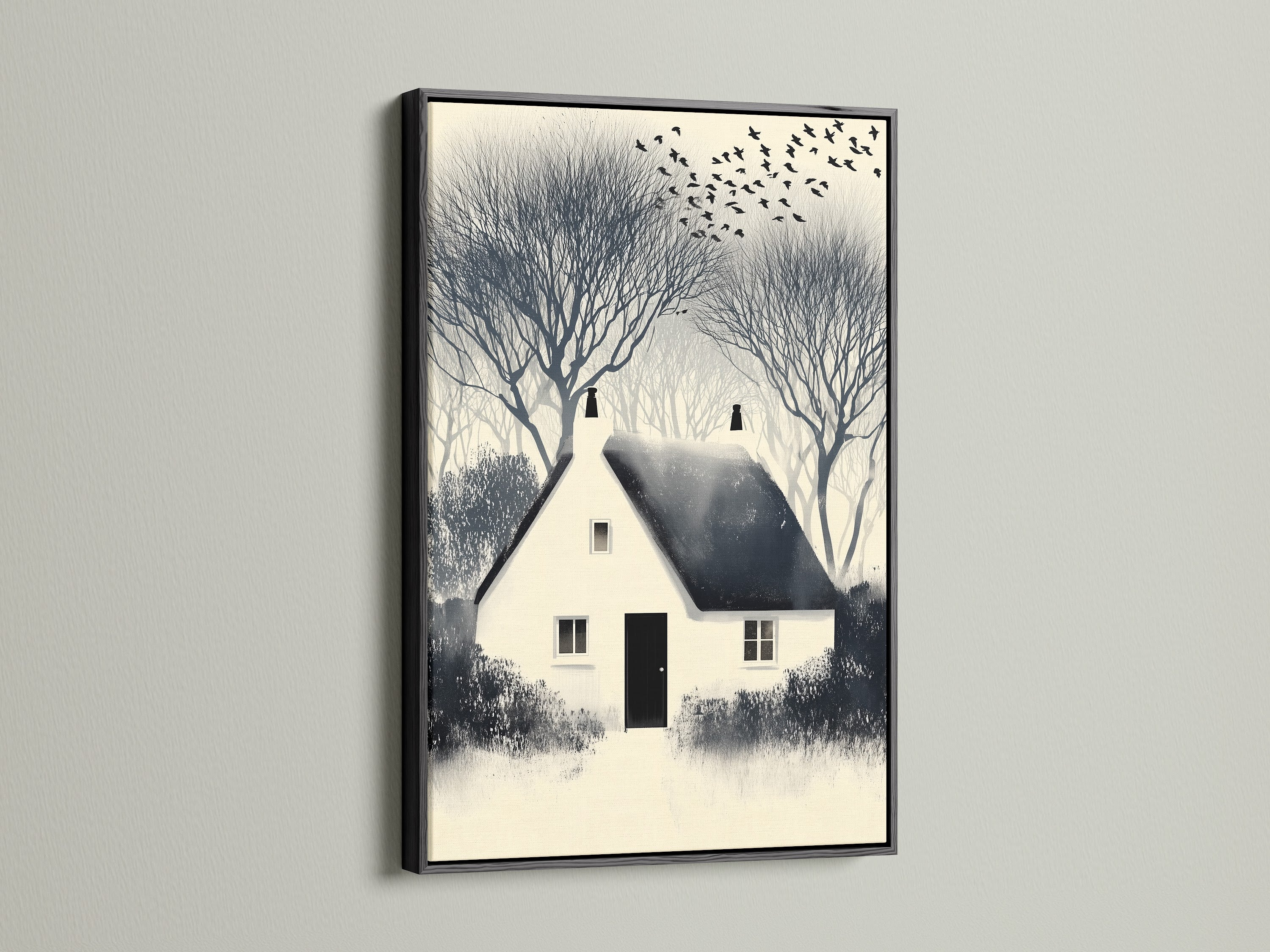 Winter Cottage artwork print with a black frame. This countryside landscape artwork adds sophistication to any space. The black frame complements the minimalist art style perfectly. Shop now for cabin artwork.