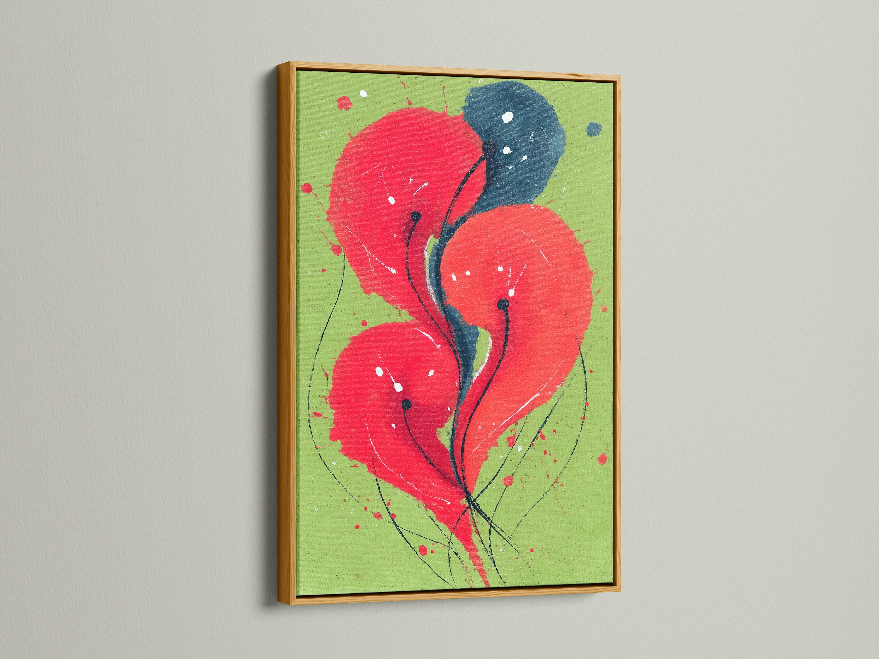 An abstract floral canvas print with a luxurious gold frame. The modern botanical artwork features red and blue colors. This piece adds elegance to your home office. Elevate your living space with this stunning wall art. It is ideal for a sophisticated decor.