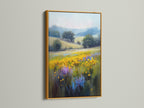 The wildflower meadow artwork is radiant in a gold frame. The piece enhances the artwork's impressionist details. It adds a touch of luxury to your living space. The yellow flowers and purple blooms create a vibrant country scene. This floral wall art is perfect for adding elegance.