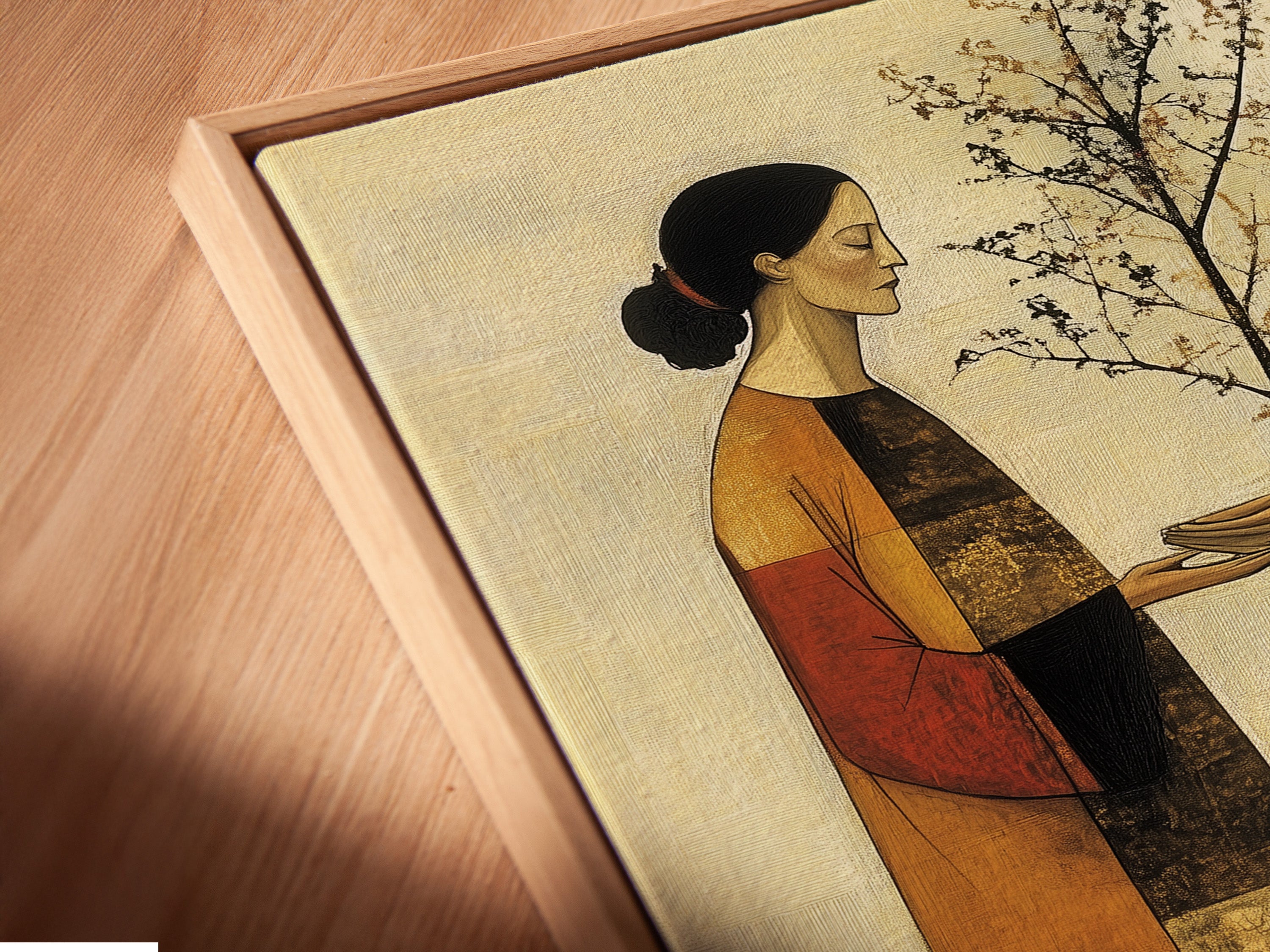 Angled close-up of a modern folk art canvas print in a floating frame. This piece shows a couple planting a tree. The contemporary artwork features earthy tones. Ideal for bedroom wall decor. The art is perfect for nature lovers.