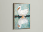 A close-up of the Egret art in an oak frame. This bird canvas print adds a touch of nature to any space.  Ideal coastal wall art for a calming atmosphere. Perfect for minimalist and Scandinavian styles. Discover how this heron print enhances your home decor.  A wonderful gift for bird lovers seeking serene artwork.
