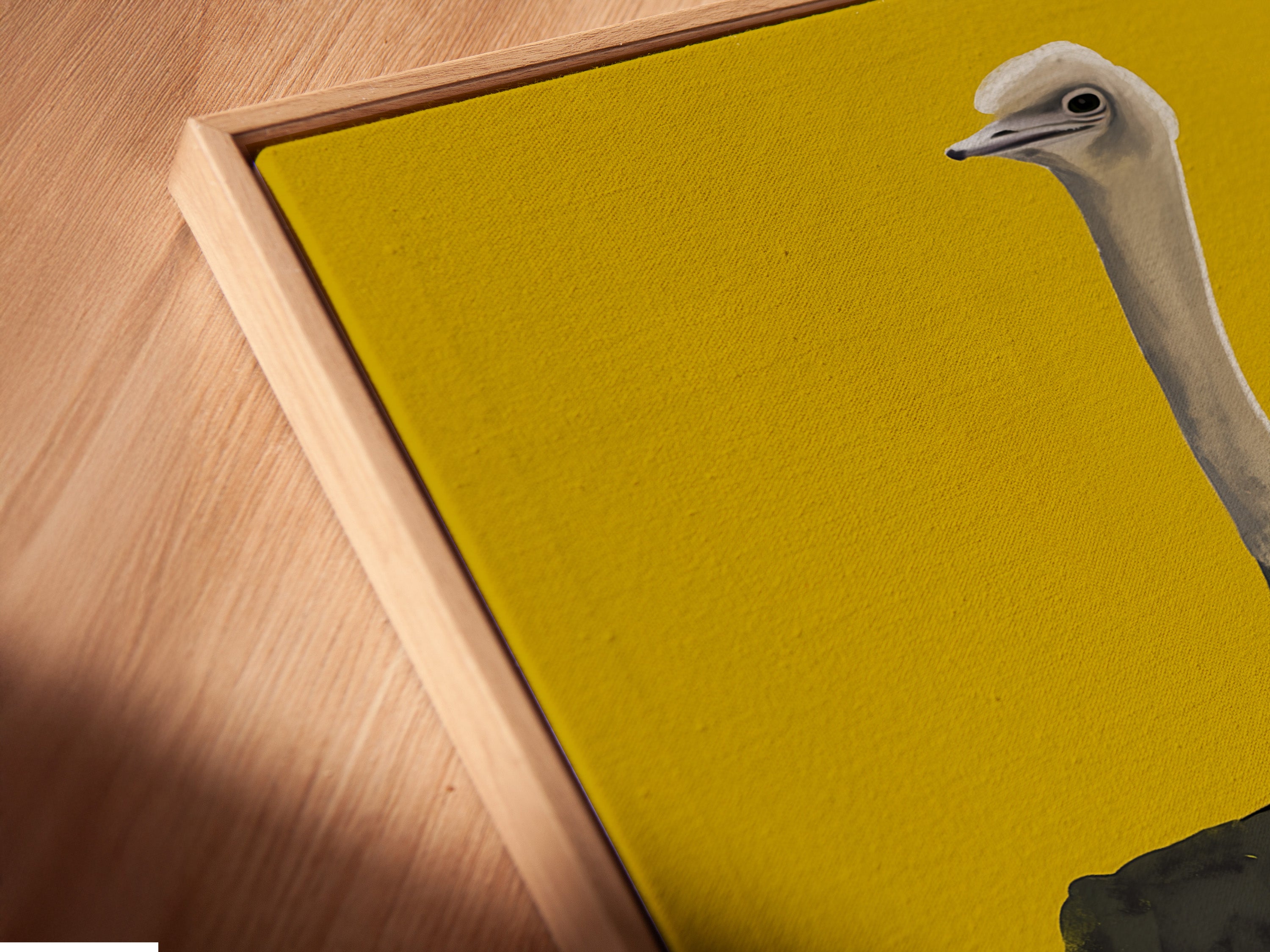 A close-up shows a canvas print in a floating frame. The floating frame gives the art a unique suspended look. This frame style adds depth and dimension to the piece. View the art in a modern and stylish way. It enhances any artwork.