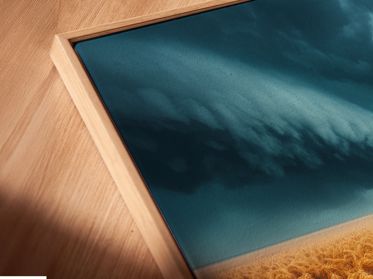 Angled close up of a canvas print in a floating frame. The wheat field artwork highlights golden tones. Farmhouse style poster adds warmth to any space. Perfect for living room wall art. The floating frame gives a modern touch to rustic art print.