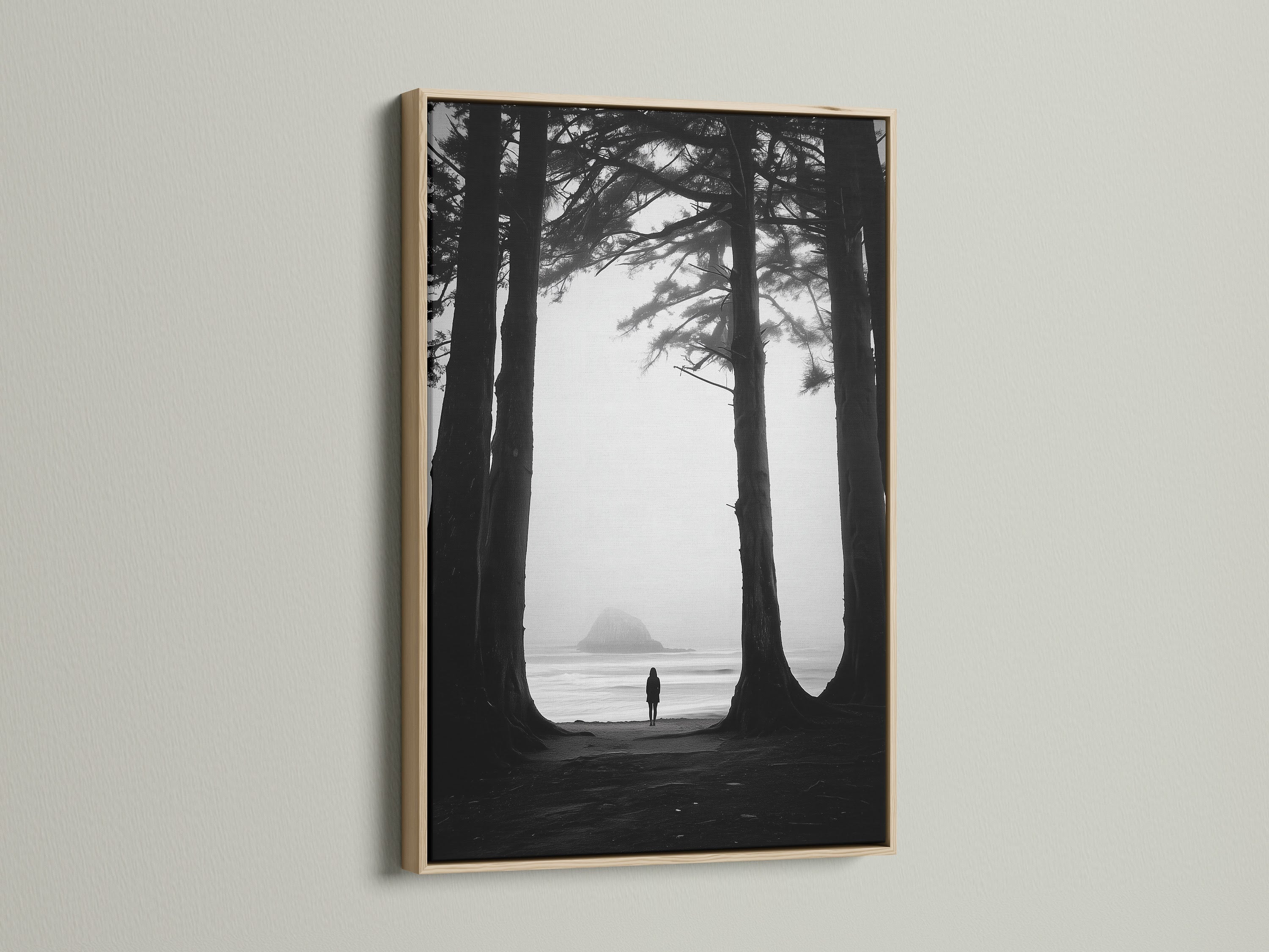 Framed artwork of a black and white beach scene. The print is surrounded by an oak frame. The oak frame enhances the artwork. It brings warmth and natural beauty to the space. Discover the appeal of oak framed art.