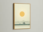 This is a desert landscape canvas print. It is showcased in a gold frame. The artwork has warm earth tones. It is minimalist wall art. The print brings southwestern decor to a home office. It creates a calming and inviting atmosphere.