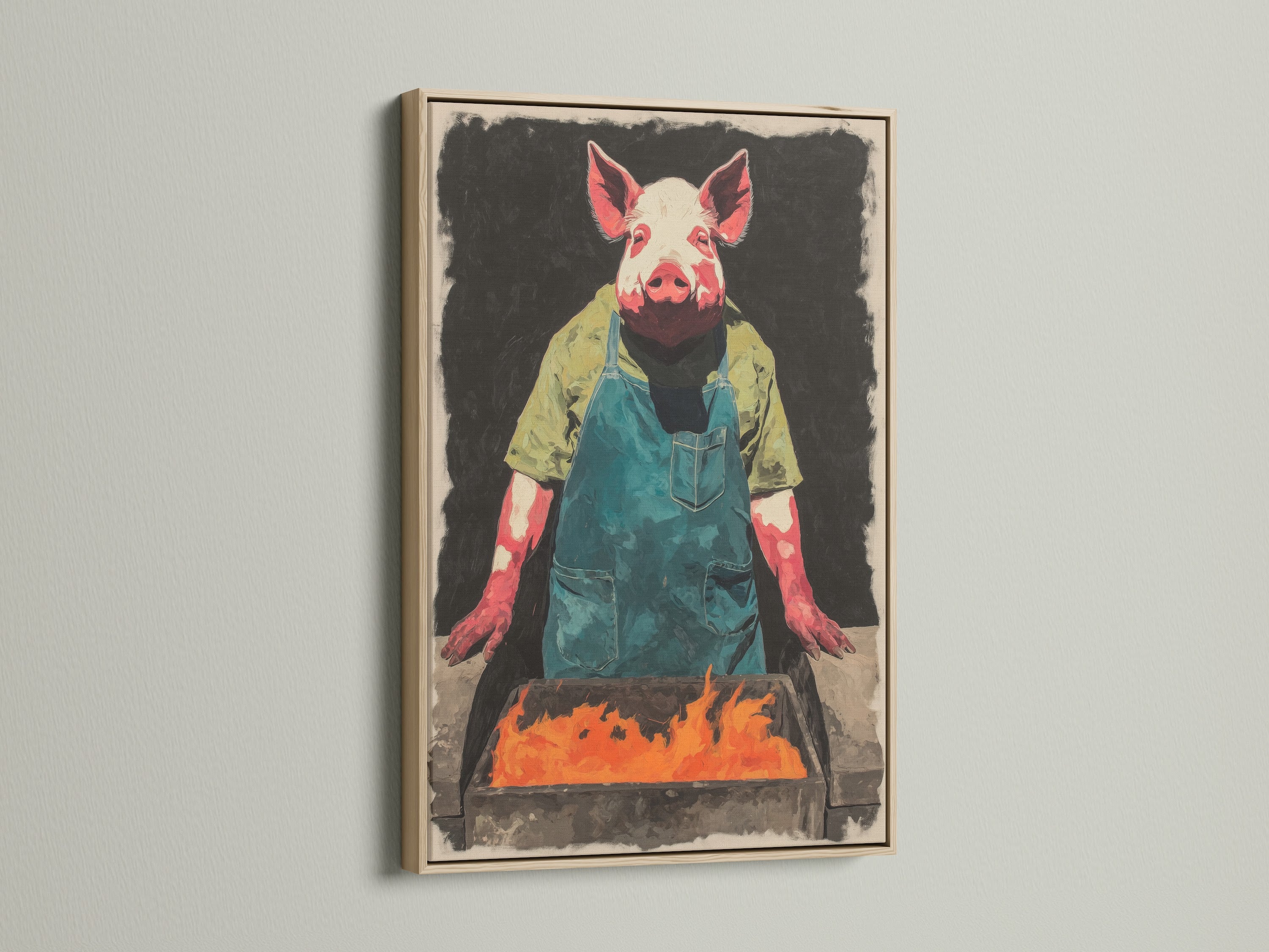 A close-up of the Pig Chef artwork in an oak frame. The print showcases a pig chef at a BBQ. The oak frame enhances the rustic and farmhouse charm. It is perfect for a kitchen or dining room. The animal chef print brings a whimsical touch to your wall decor.