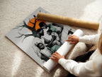 A woman is carefully rolling a fine art poster paper. The high-quality paper ensures vibrant colors and sharp details. This poster paper is perfect for printing your favorite artwork. This print is ideal for any art lover or homeowner.