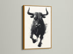 A bull art print is displayed in a gold frame. This piece adds a touch of luxury to any room. The gold frame enhances the black and white halftone artwork. It is perfect for elevating your living room or office decor. This animal canvas print offers a sophisticated and stylish touch. Transform your space with this elegant artwork.